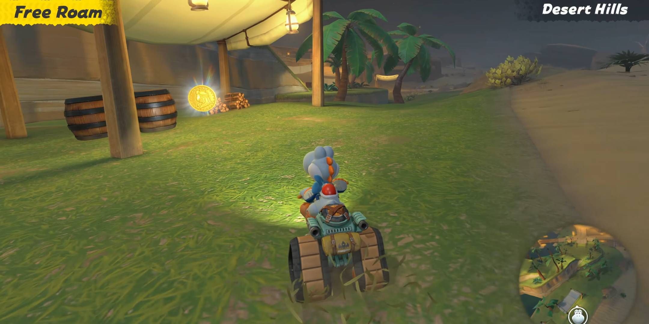 Yoshi driving up to a gold coin collectible in Mario Kart World&rsquo;s free roam mode.
