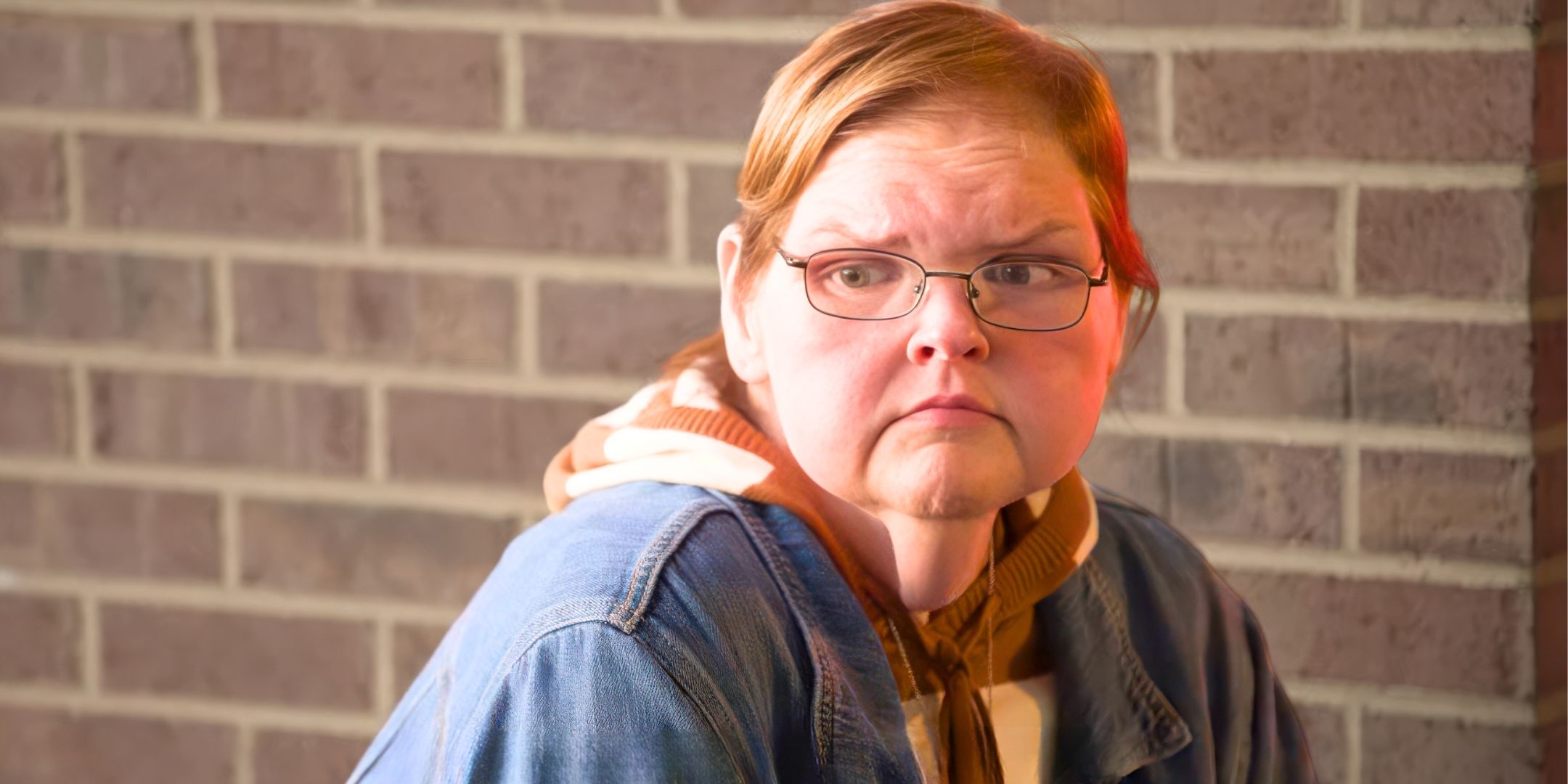 1000-lb Sisters Tammy Slaton close up looking down and sad