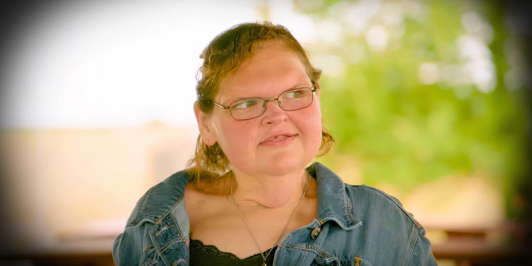 1000-Lb Sisters' Tammy Slaton wearing denim jacket and smiling