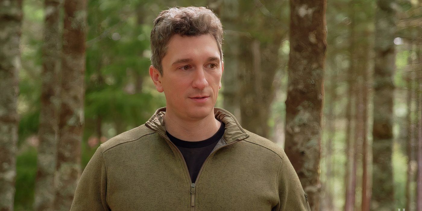 Alex Lagina on The Curse Of Oak Island wearing green and standing outdoors