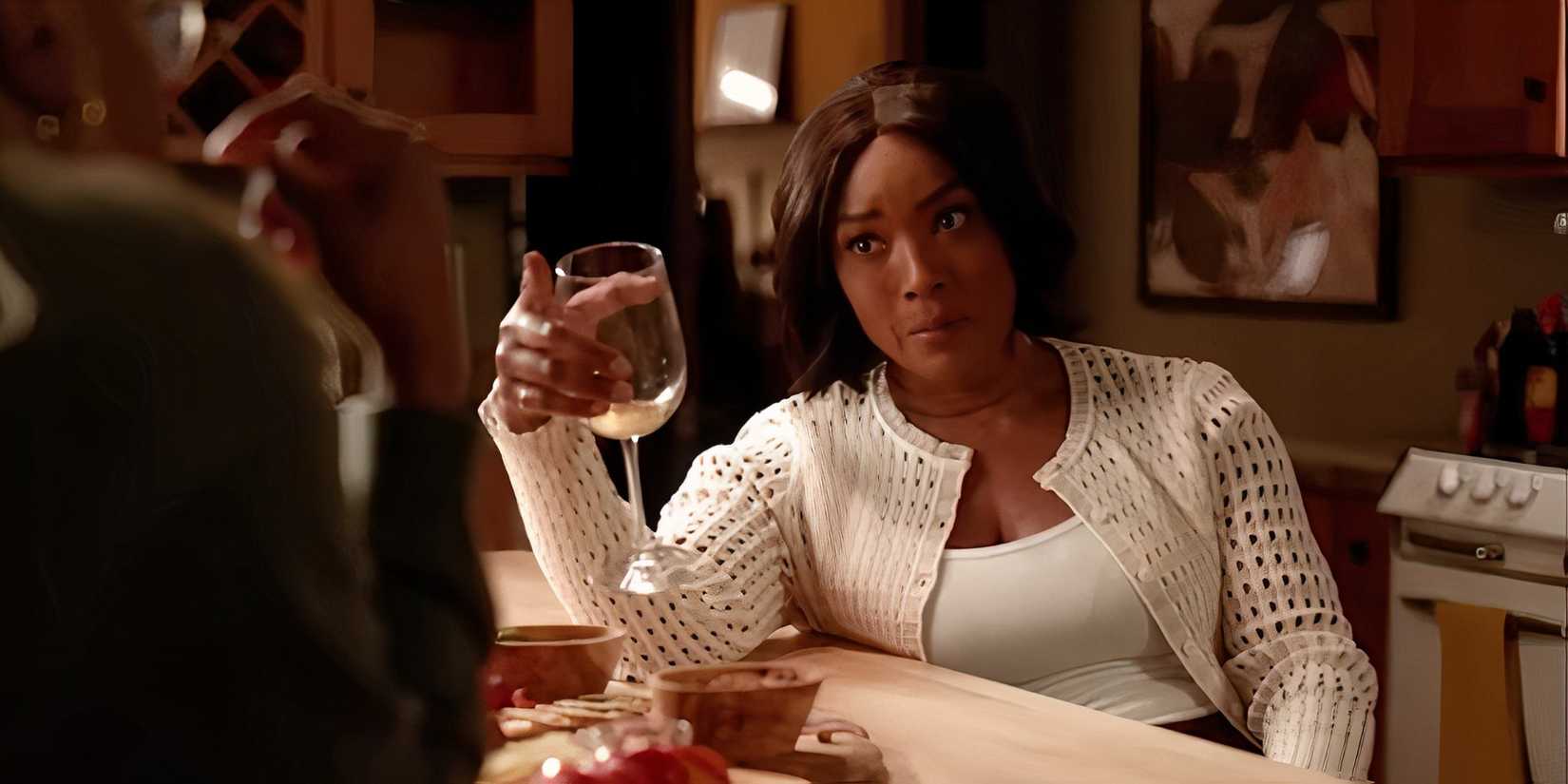 9-1-1 Angela Bassett as Athena Grant in season 8 episode 17 kitchen holding wine glass