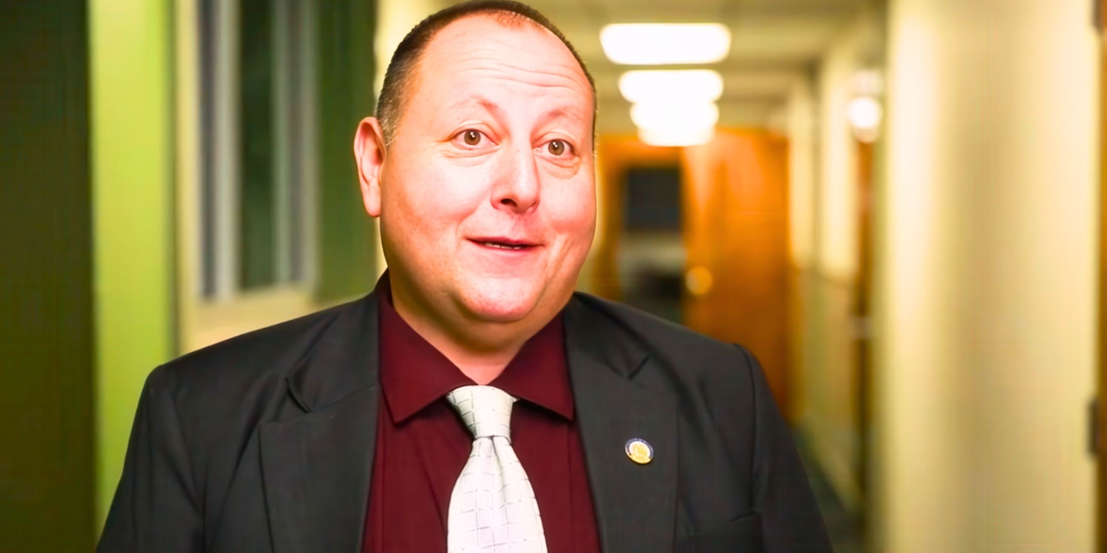 90 Day Fiancé’s David Toborowsky smiles in a hallway