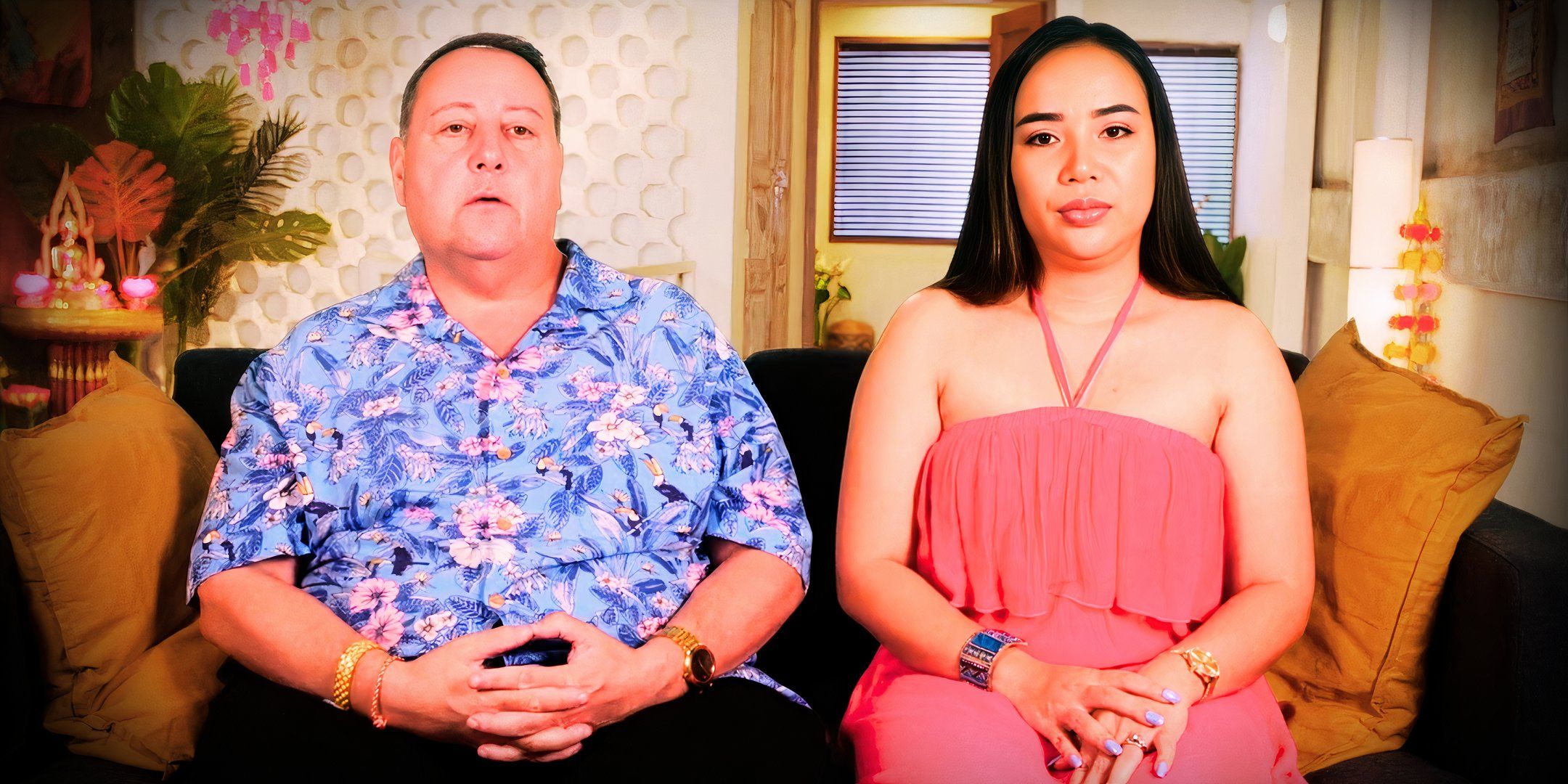 90 day fiance stars david toborowsky and annie suwan sitting on couch in still looking serious