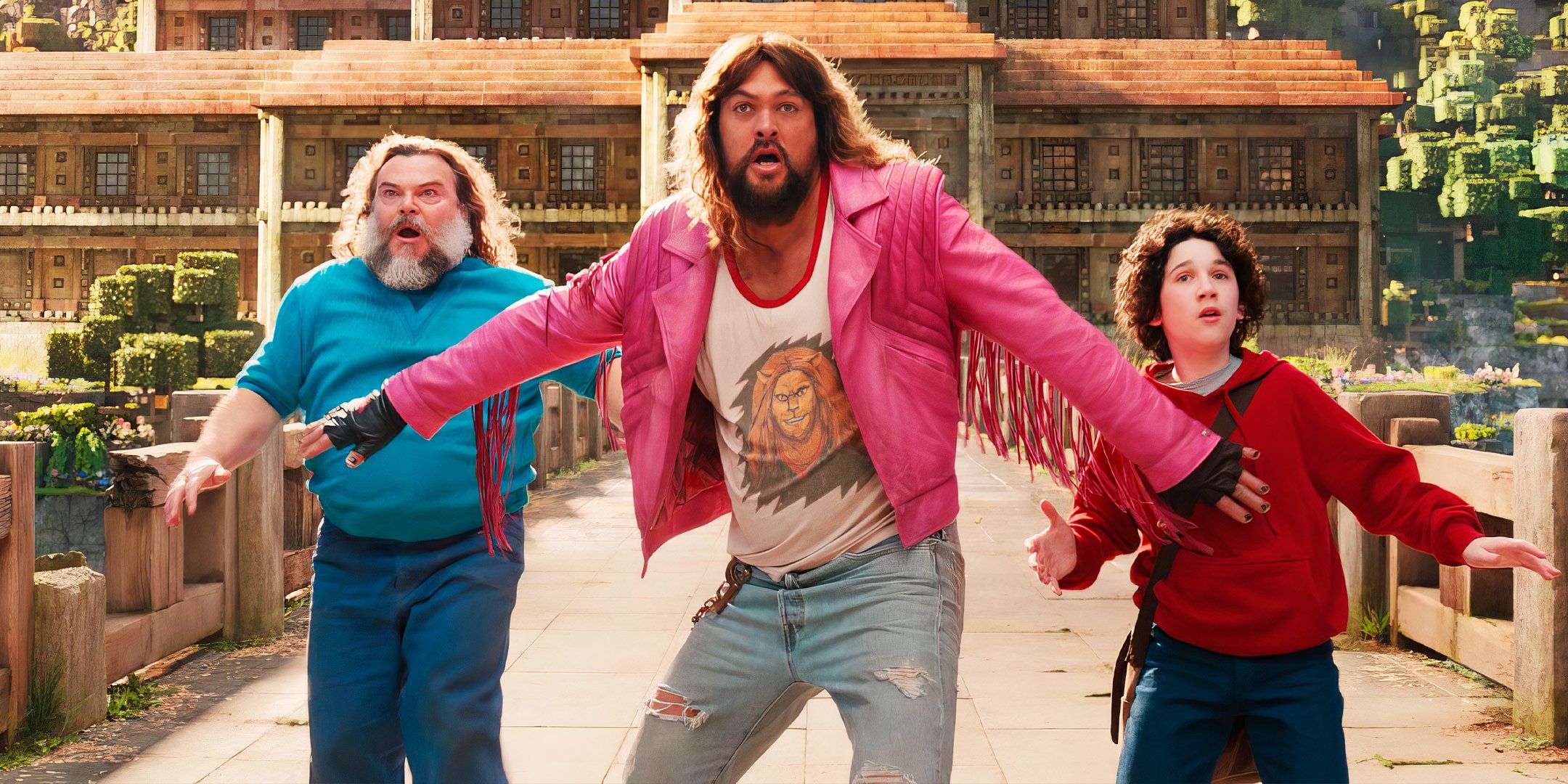 Jason Momoa holds back Jack Black as Steve and Sebastian Hansen in an important moment in A Minecraft Movie