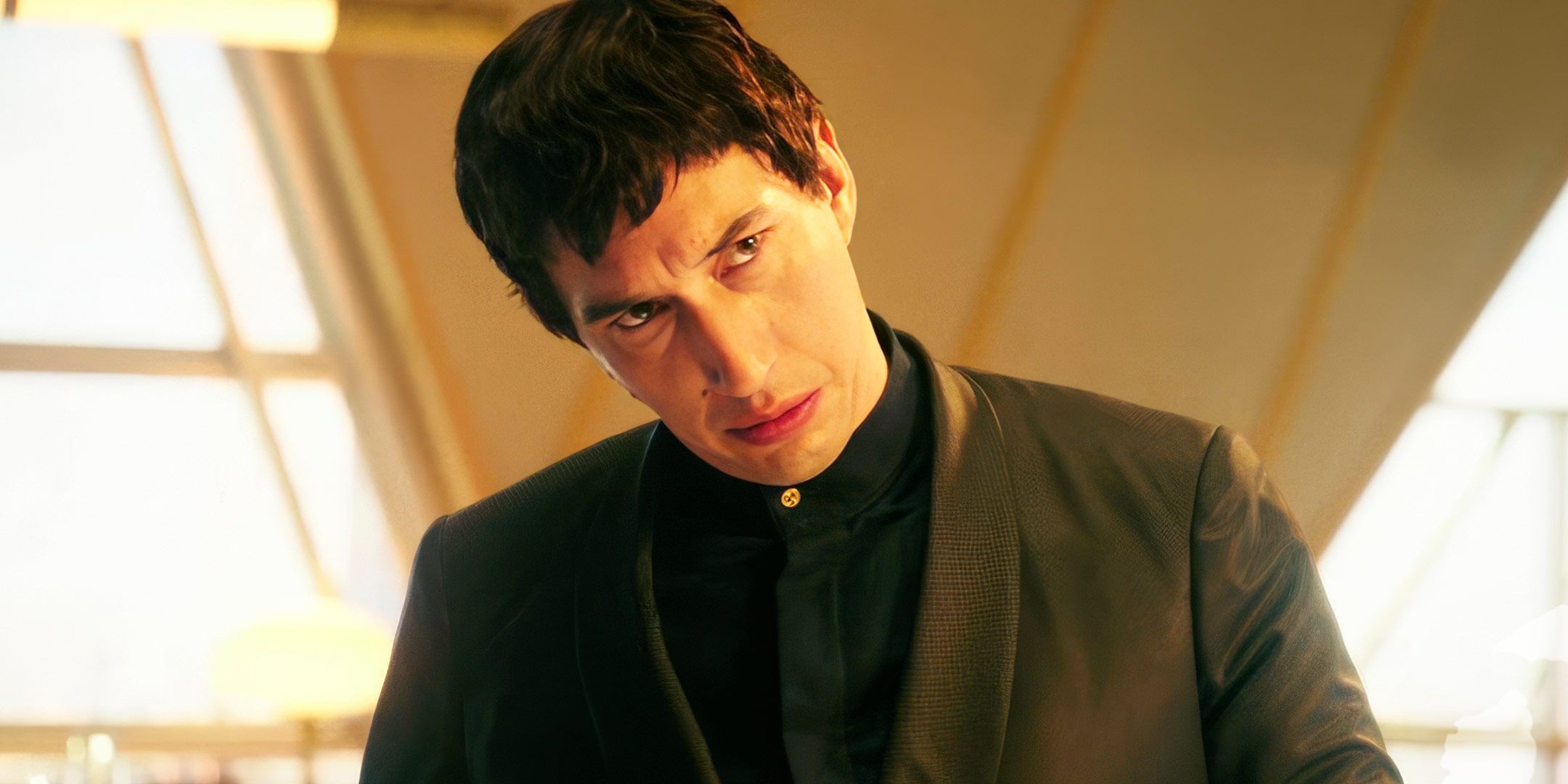 Adam Driver tilting his head in Megalopolis