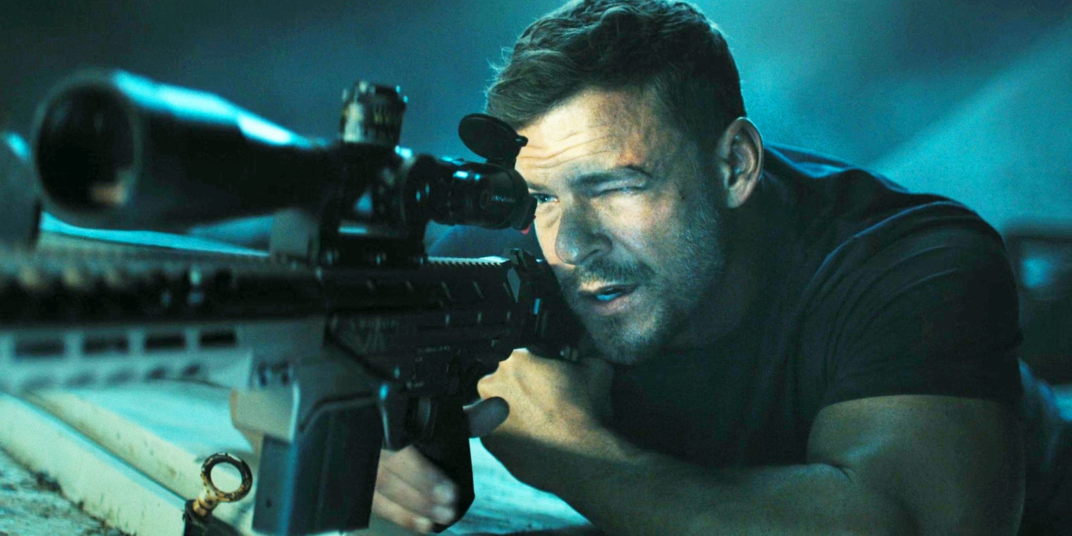 Alan Ritchson with a Sniper Rifle in Reacher