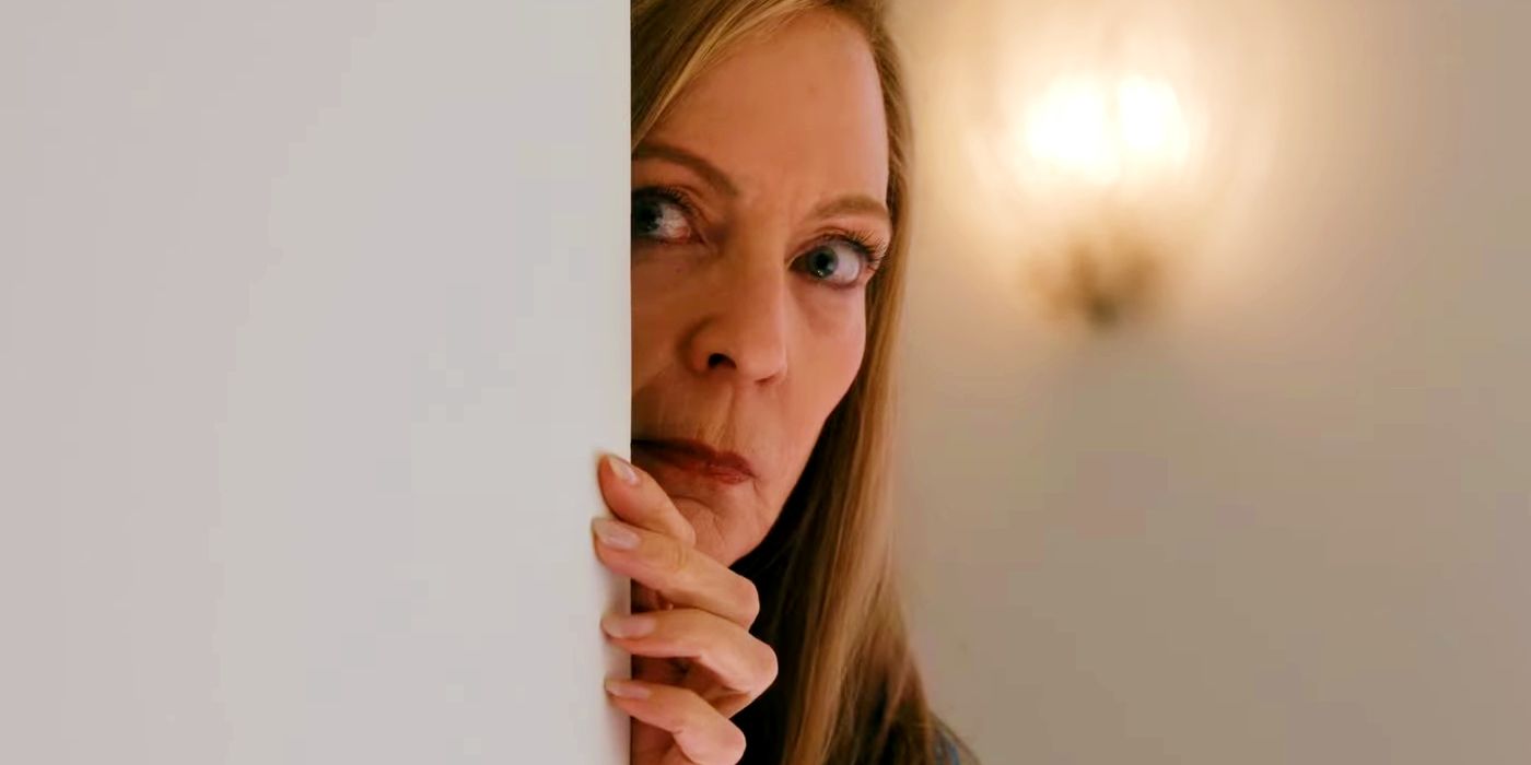 Allison Janney as Linda peering around a corner in Another Simple Favor