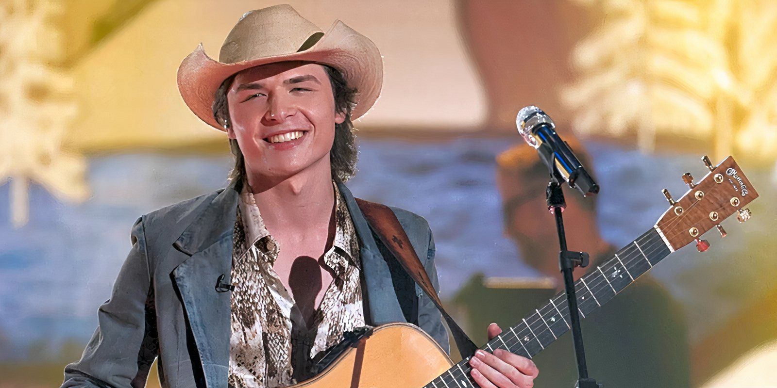 American Idol Season 23 Contestant John Foster Smiling On Stage