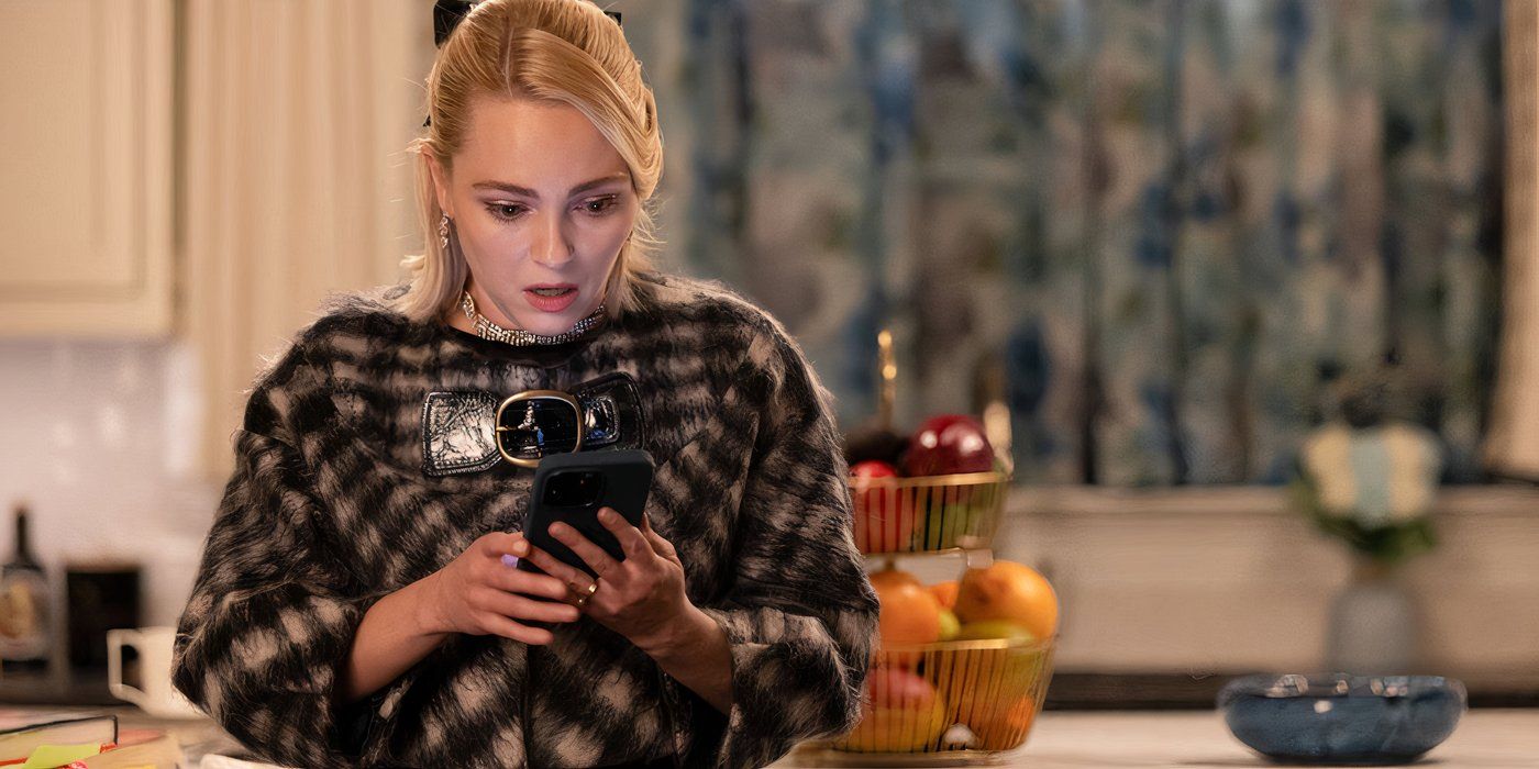 AnnaSophia Robb as Alice looking at her phone in Grosse Pointe Garden Society