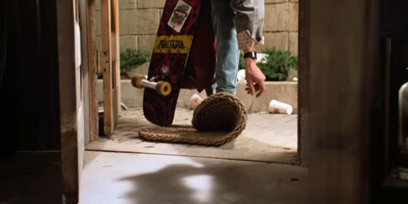 Michael J. Fox as Marty McFly entering Doc's lab with his skateboard in the opening scene of Back to the Future (1985)