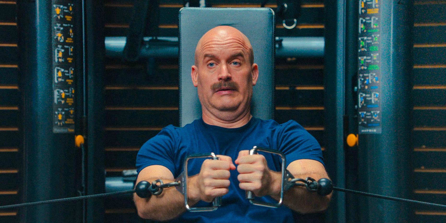 Character of Tom Segura training in the gym in Bad Thoughts Season 1 Ep 6