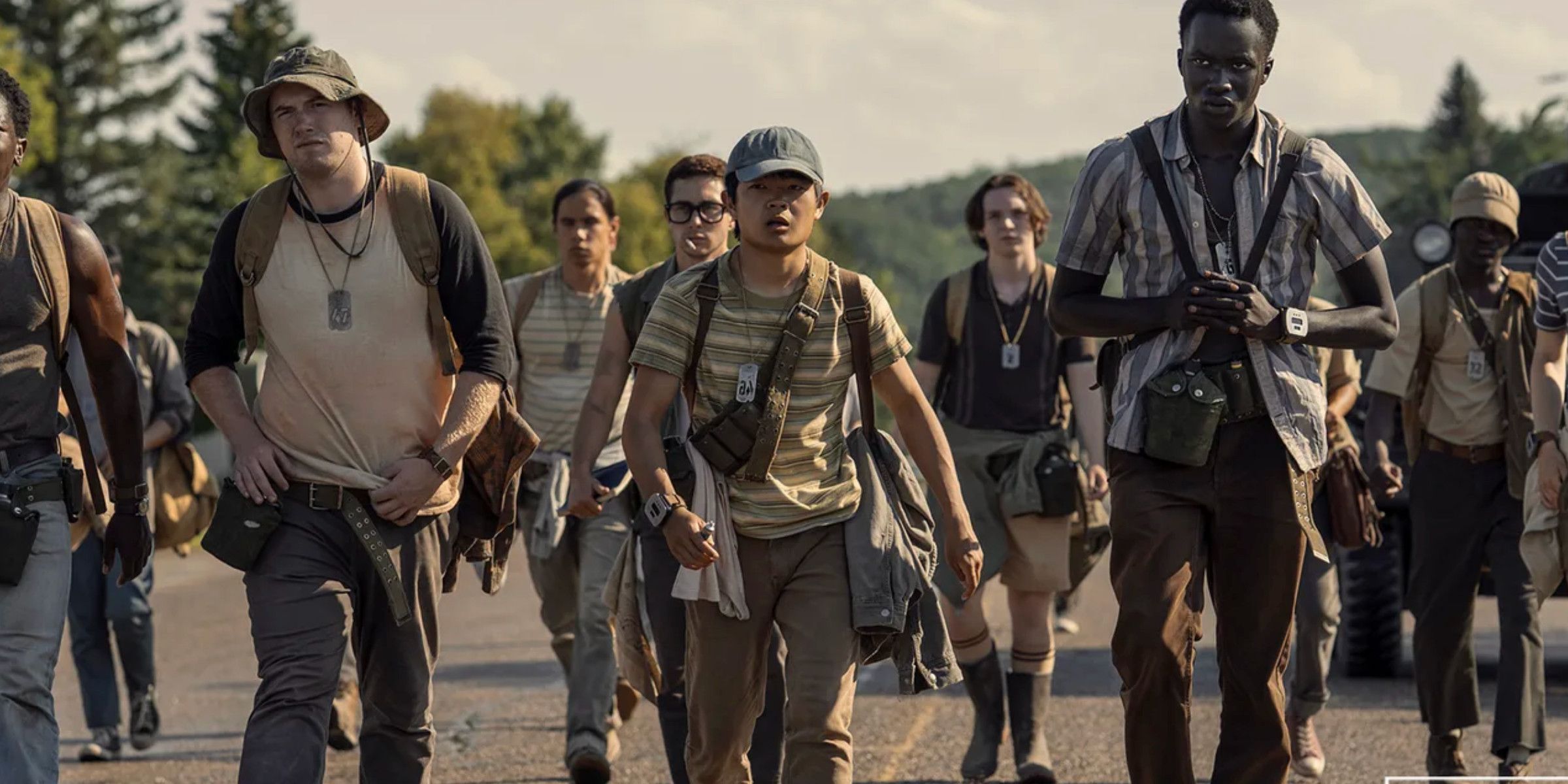 Ben Wang, Cooper Hoffman and ensemble in The Long Walk 