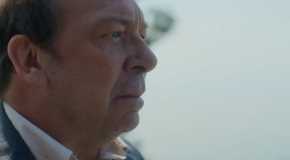 Bill Camp as Bruce looking seriously out at the ocean in Sirens