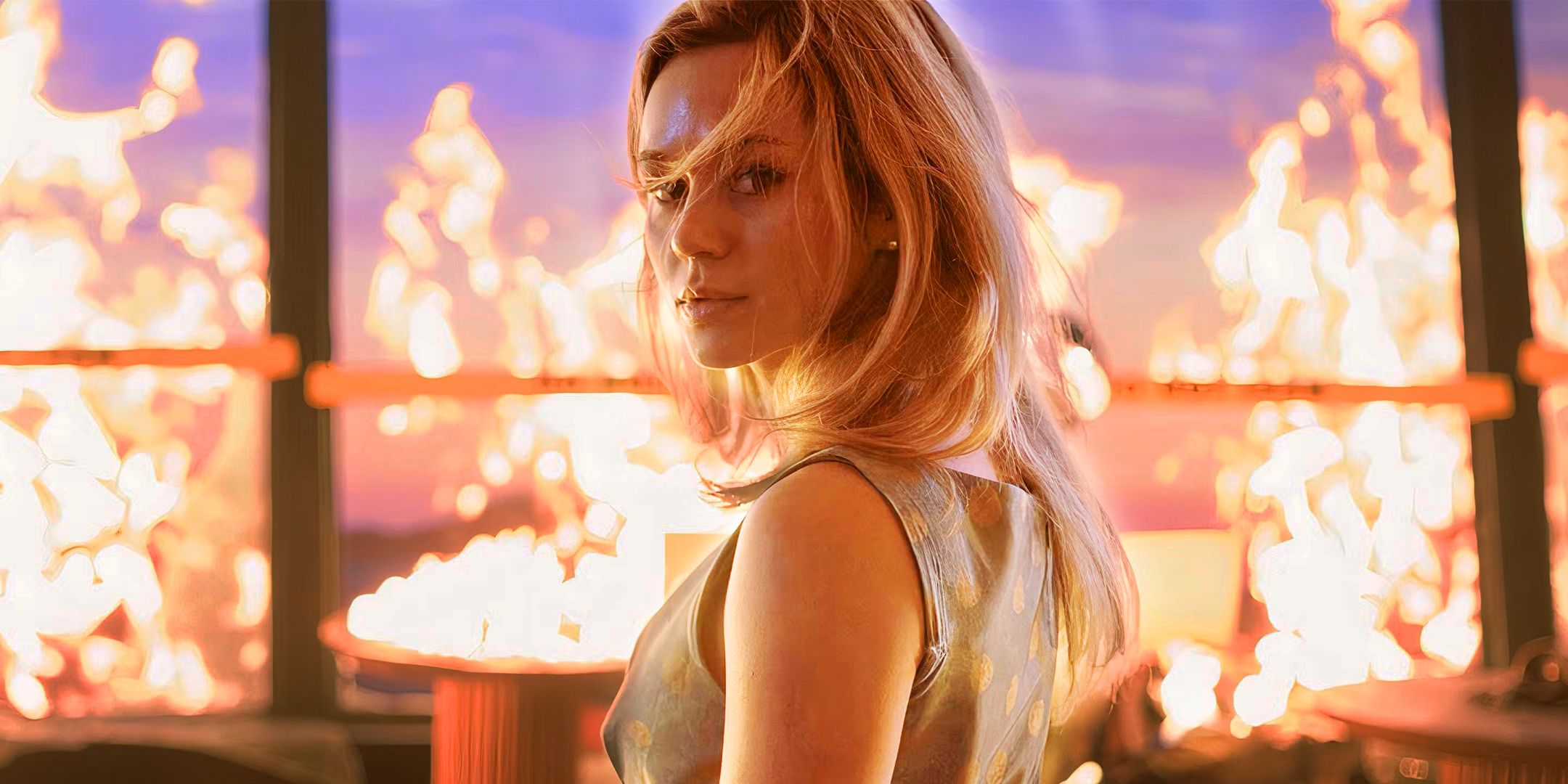 Brec Bᴀssinger in Final Destination Bloodlines in Front of a Burning Building
