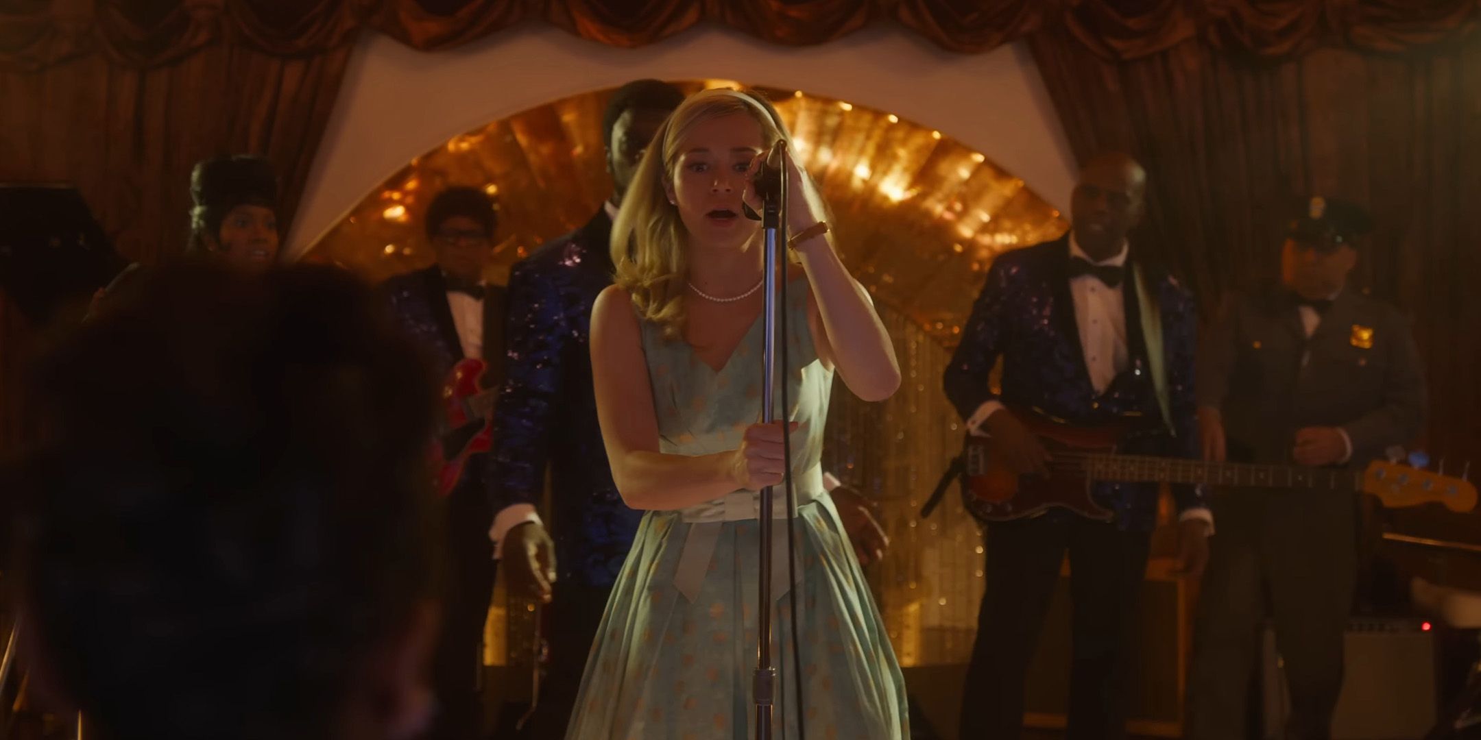 Brec Bassinger's Iris warning everyone on the stage in Final Destination Bloodlines