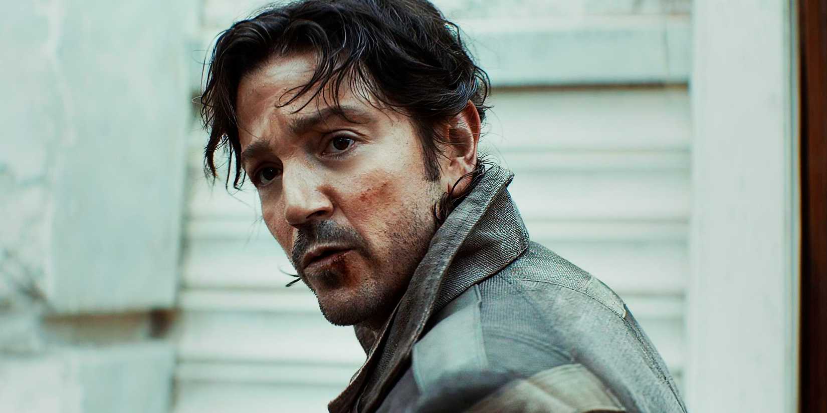 Cassian Andor during the Ghorman Massacre looking distressed in Andor season 2