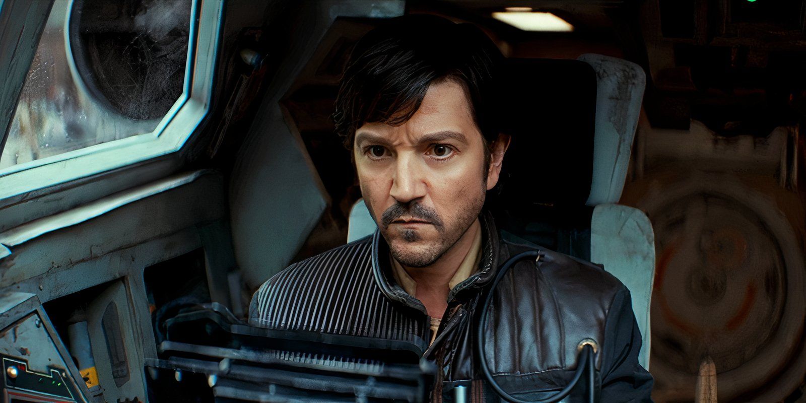 Cassian Andor sitting at the controls of his ship in the series finale of Andor.