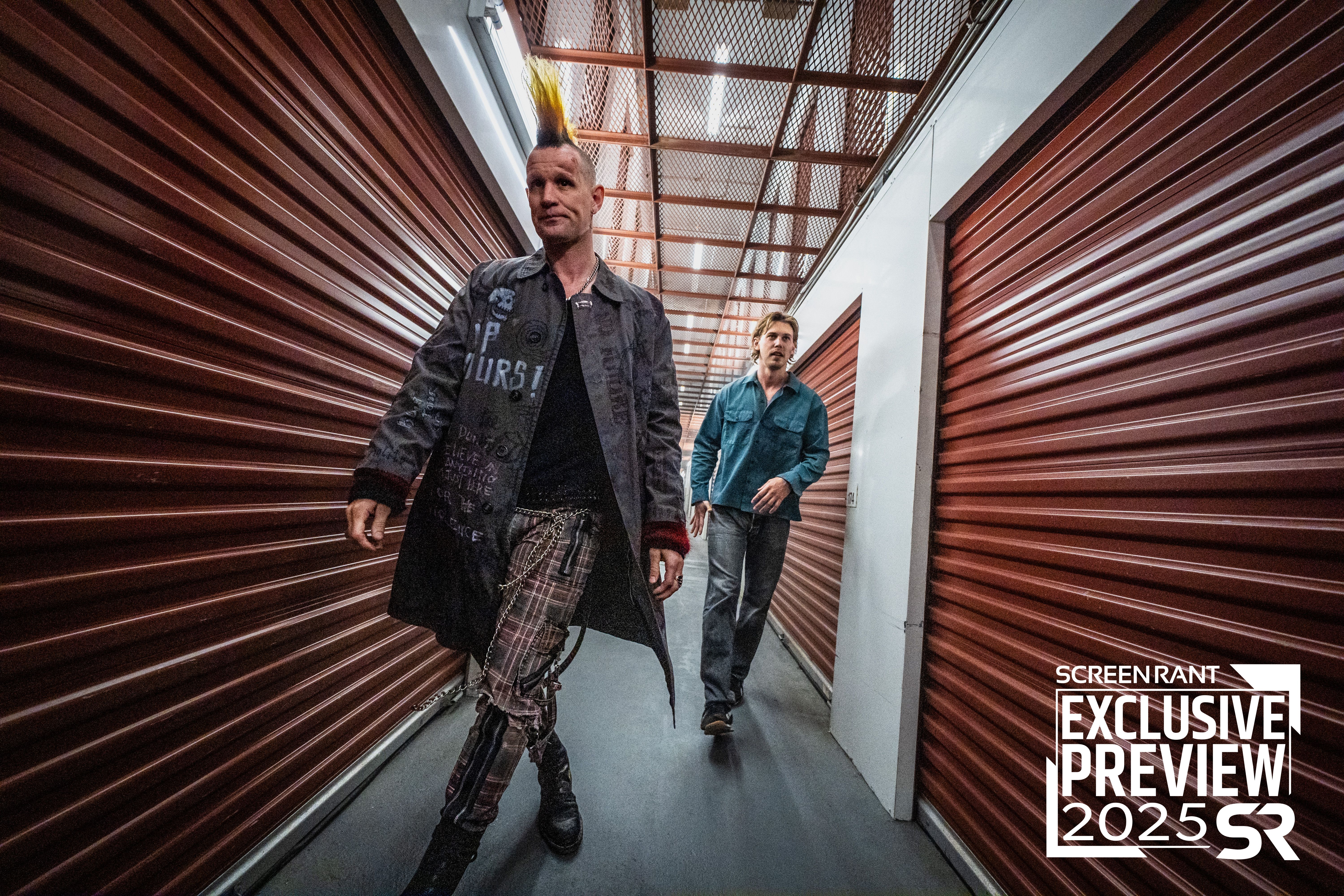 Austin Butler as Hank and Matt Smith as Russ walking down a hallway in a storage facility in Caught Stealing