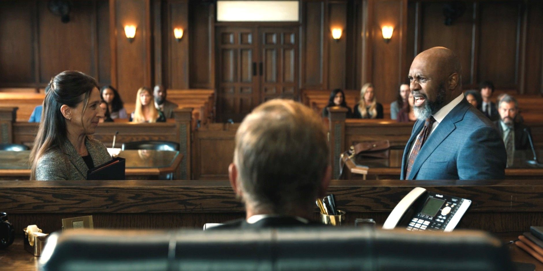 Two lawyers arguing in front of a judge in Good American Family episode 8