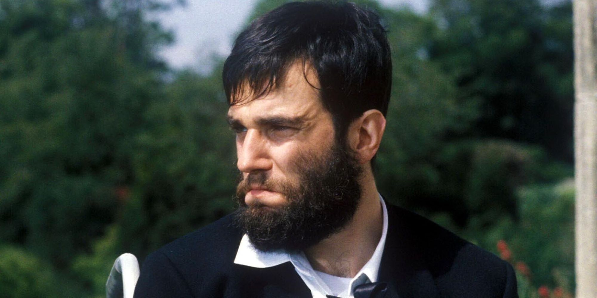 Daniel Day-Lewis in My Left Foot scowling and looking off to the side