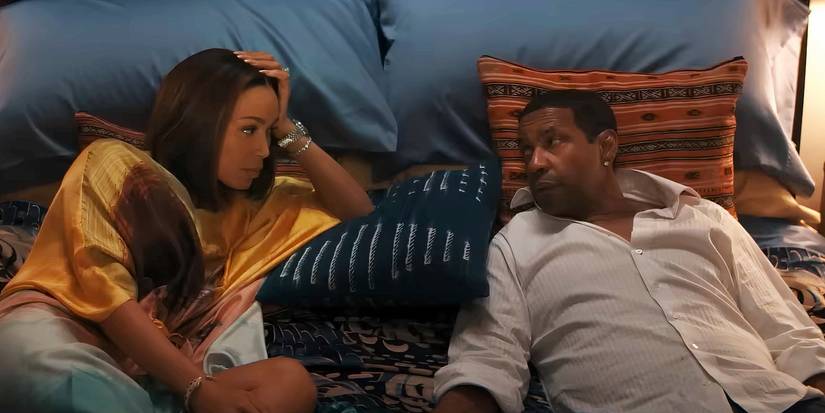 Denzel Washington is in bed while someone is looking at him in Highest 2 Lowest