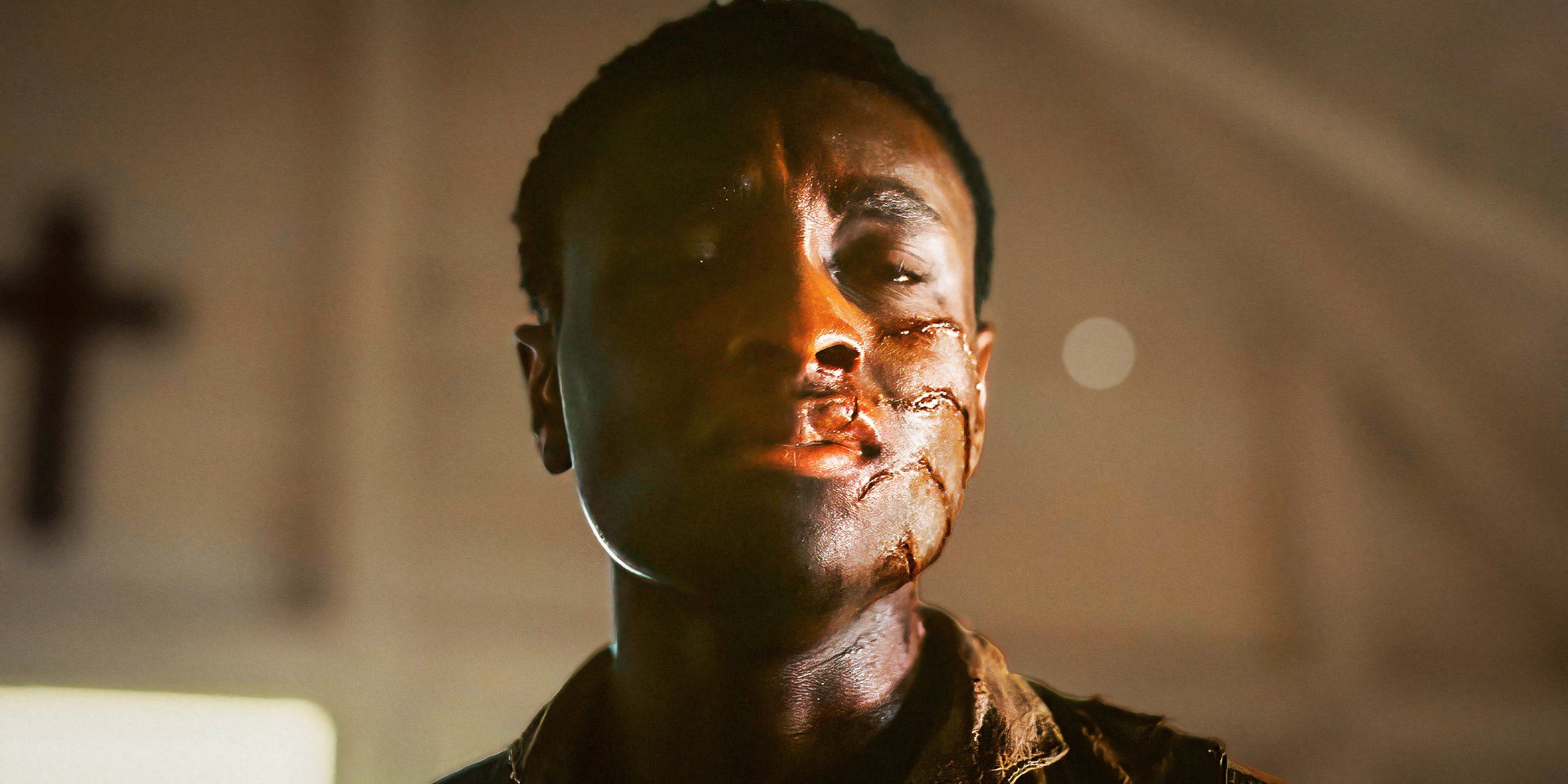 Sammie with a claw mark on his face in Sinners