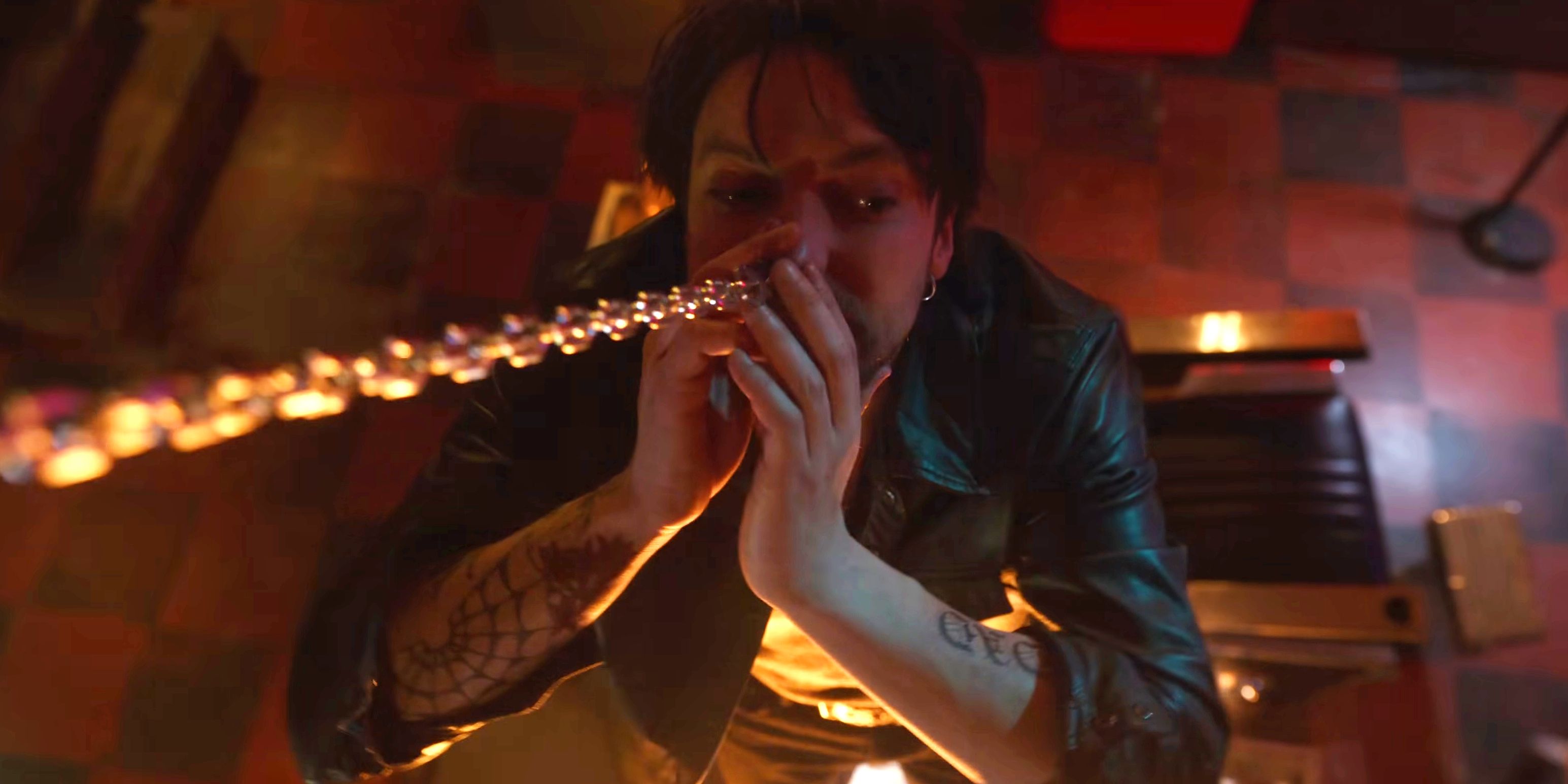 Erik sH๏τ from above as he tried to disconnect the chain from his nose ring in Final Destination Bloodlines