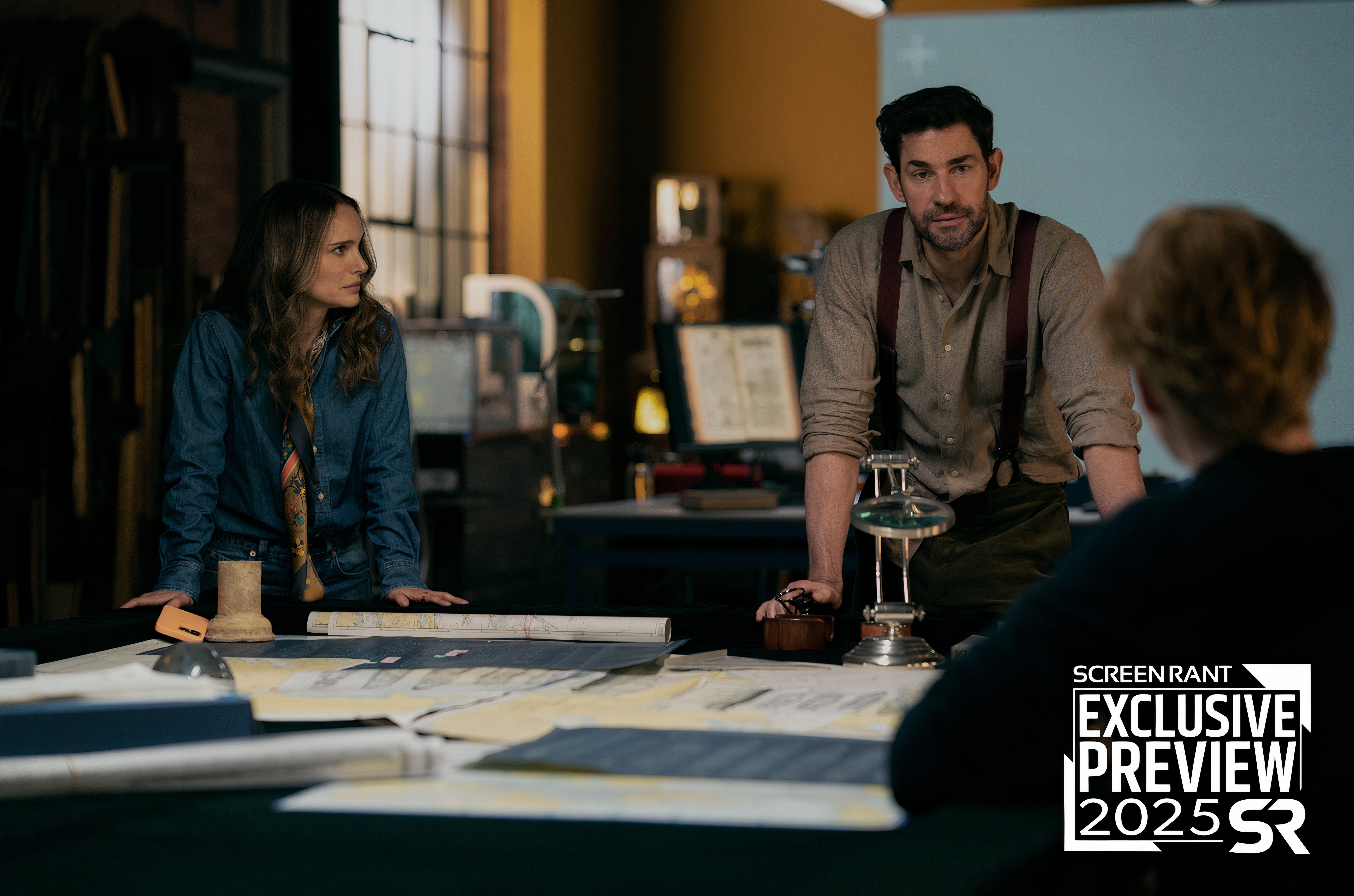 Natalie Portman skeptically looks over at John Krasinski in Fountain of Youth