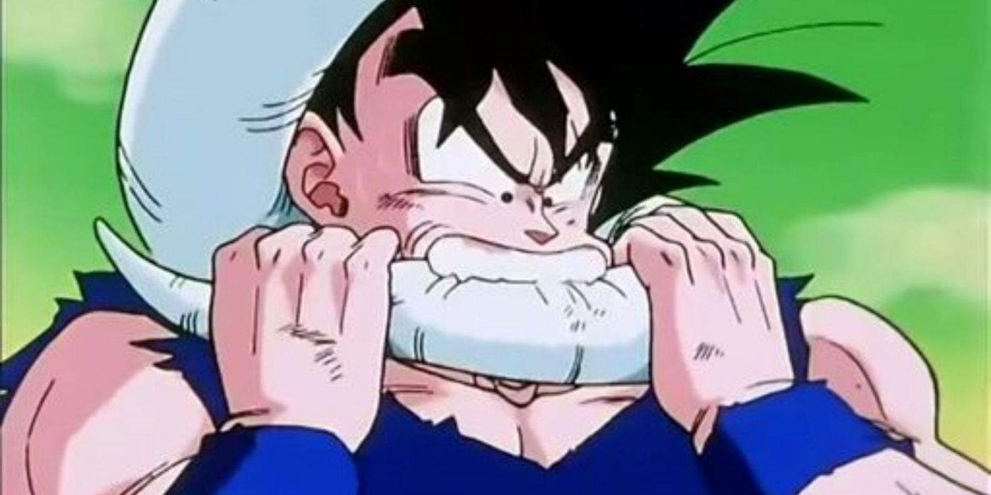Goku muerde la cola de Frieza para evitar que lo asfixie. 