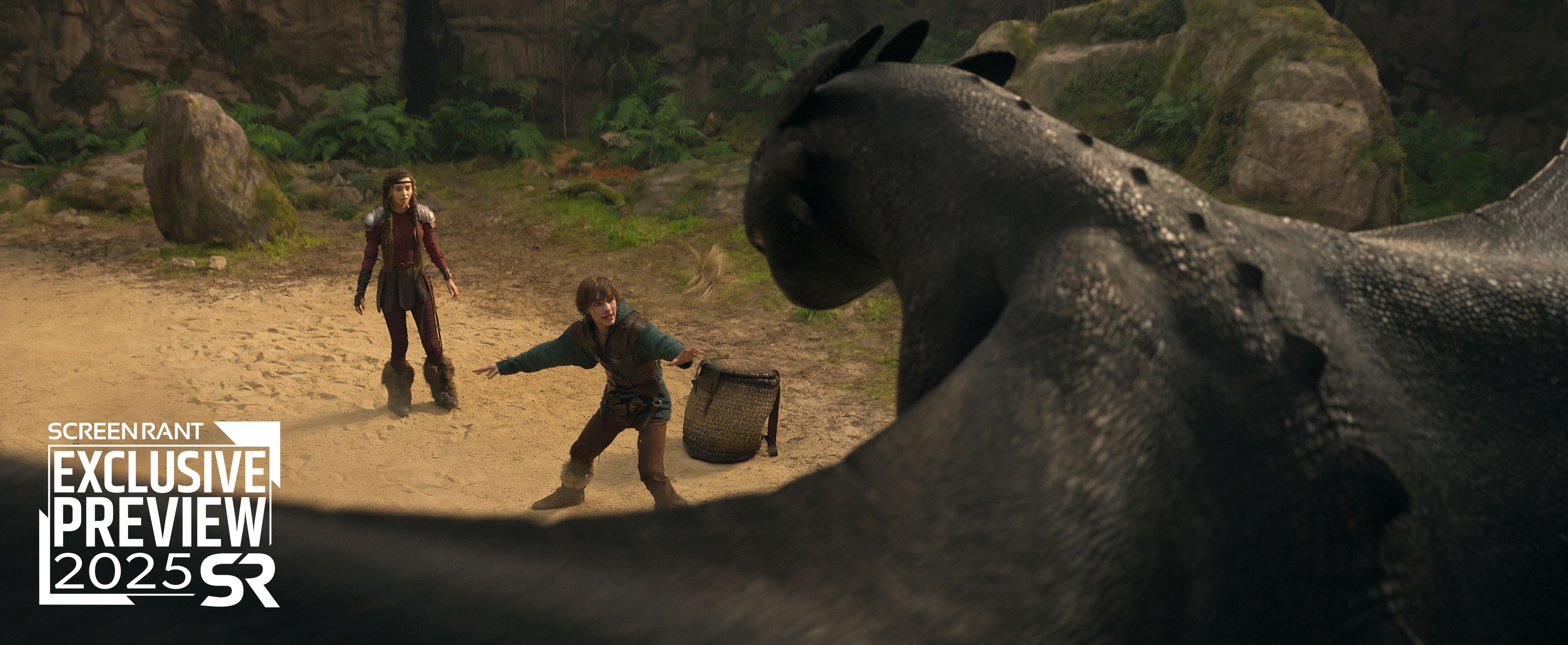 Hiccup and Astrid are looking at Toothless in How To Train Your Dragon 2025 Movie Still ScreenRant Exclusive