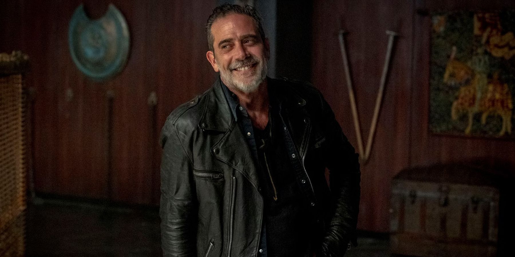 Jeffrey Dean Morgan smirking as Negan in The Walking Dead: Dead City season 2