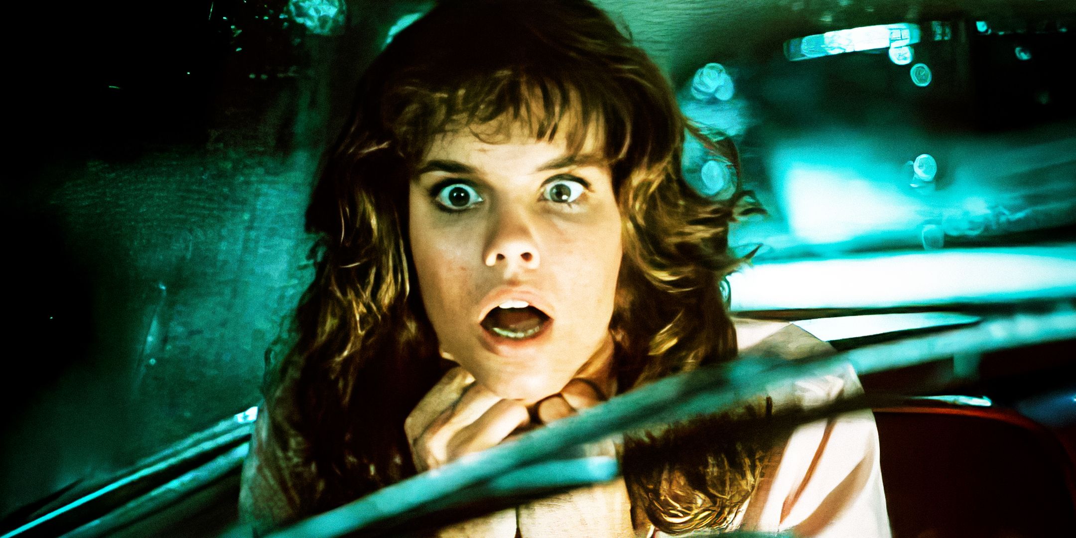 Leigh is strangled while sitting inside the car in Christine