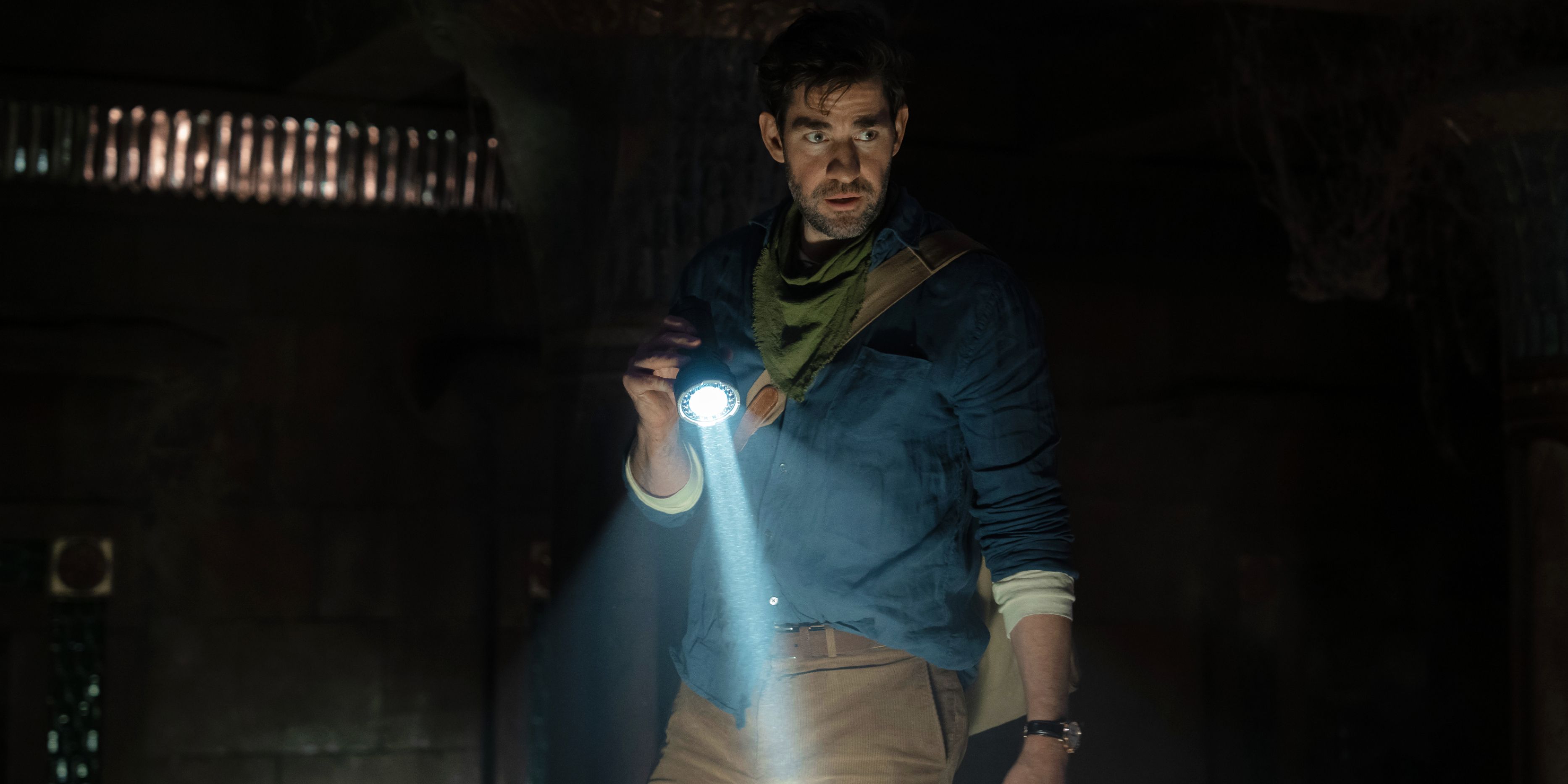 franetic-digital-marketing John Krasinski as Luke holding a flashlight in Fountain of Youth