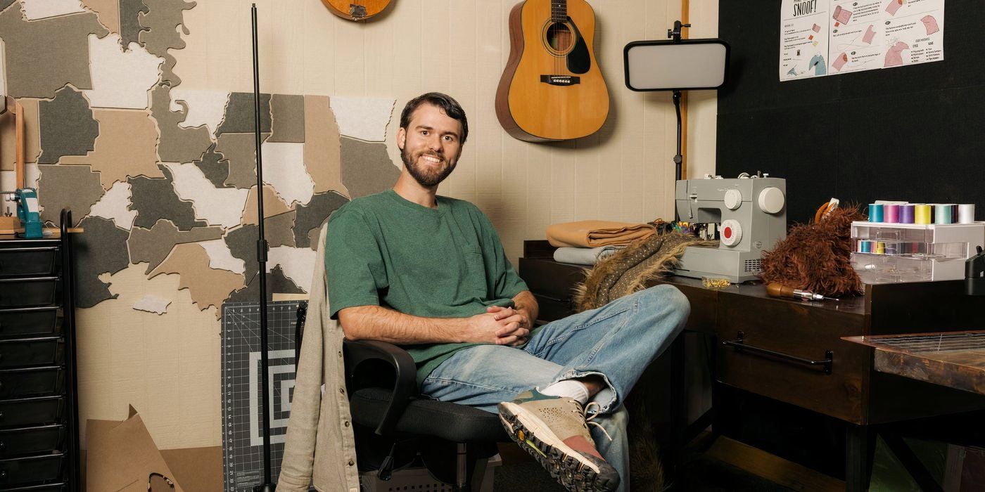 Duck Dynasty: The Revival's John Luke Robertson sitting at a desk surrounded by instruments