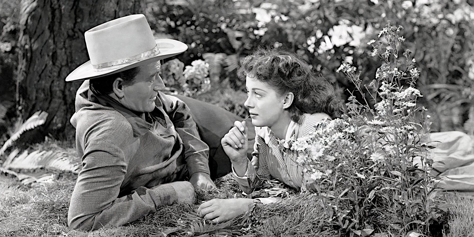 John Wayne and Gail Russell share a tender moment in Angel and the Badman