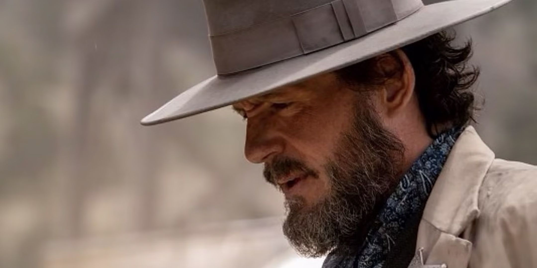Josh Hopkins as Wood looking intensely at something in Rust