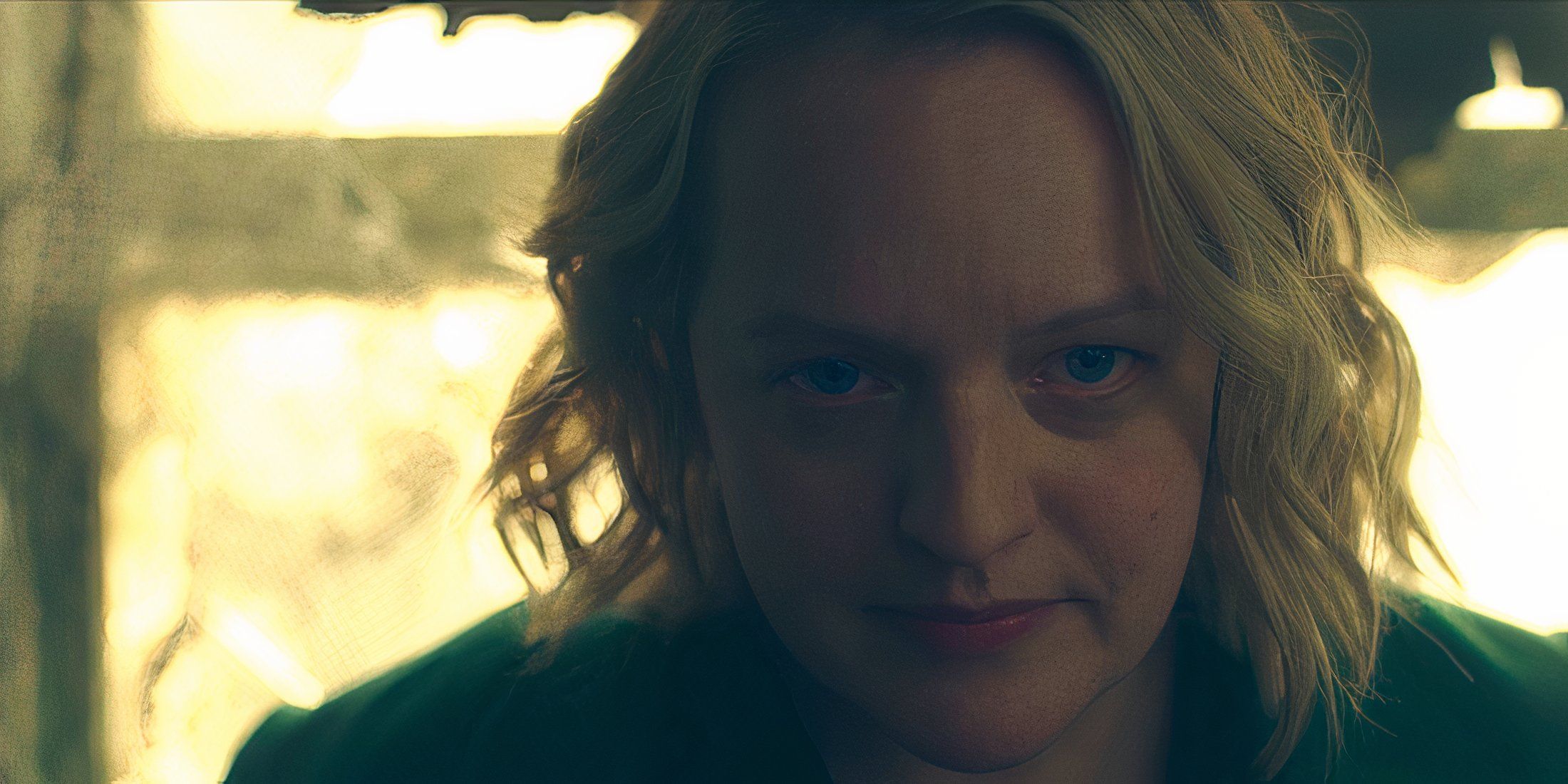 June looking serious while in the burned down Waterford home in The Handmaid's Tale season 6 episode 10