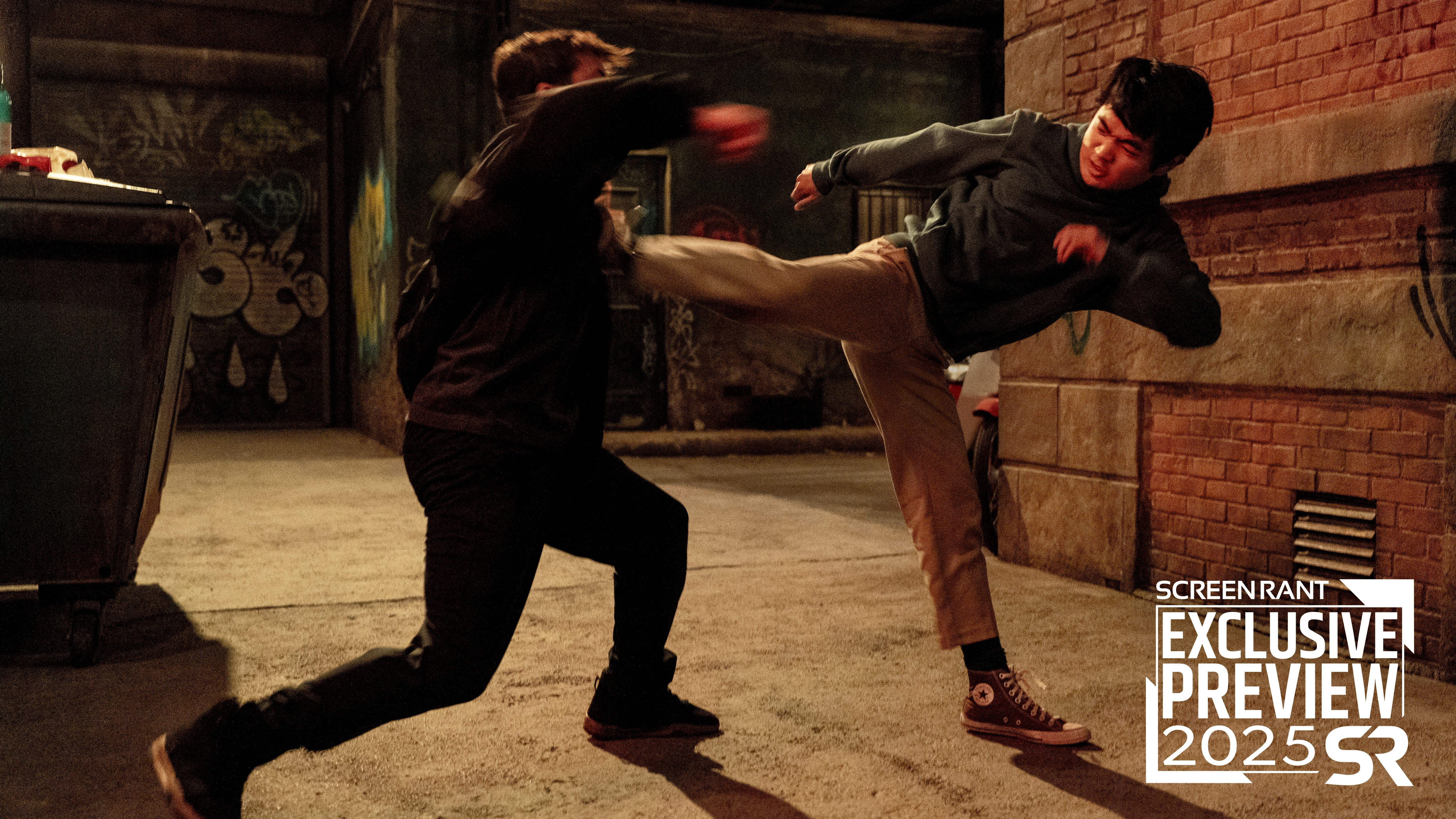Ben Wang kicking with an intense look on his face in Karate Kid: Legends