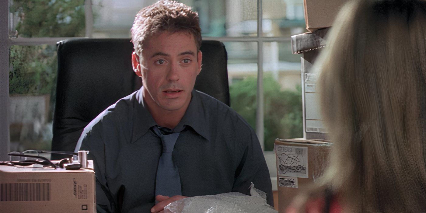 Larry Paul behind a desk in Ally McBeal