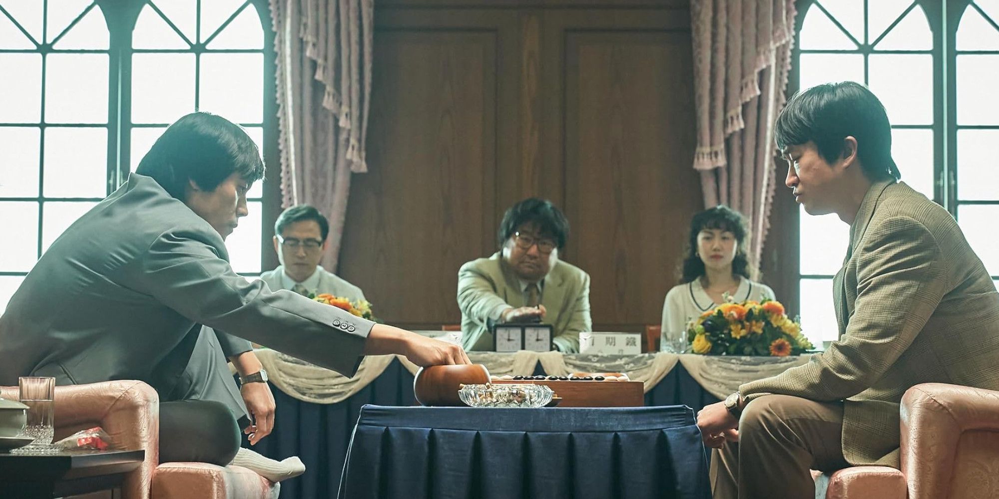 Lee Byung-hun and ensemble in The Match