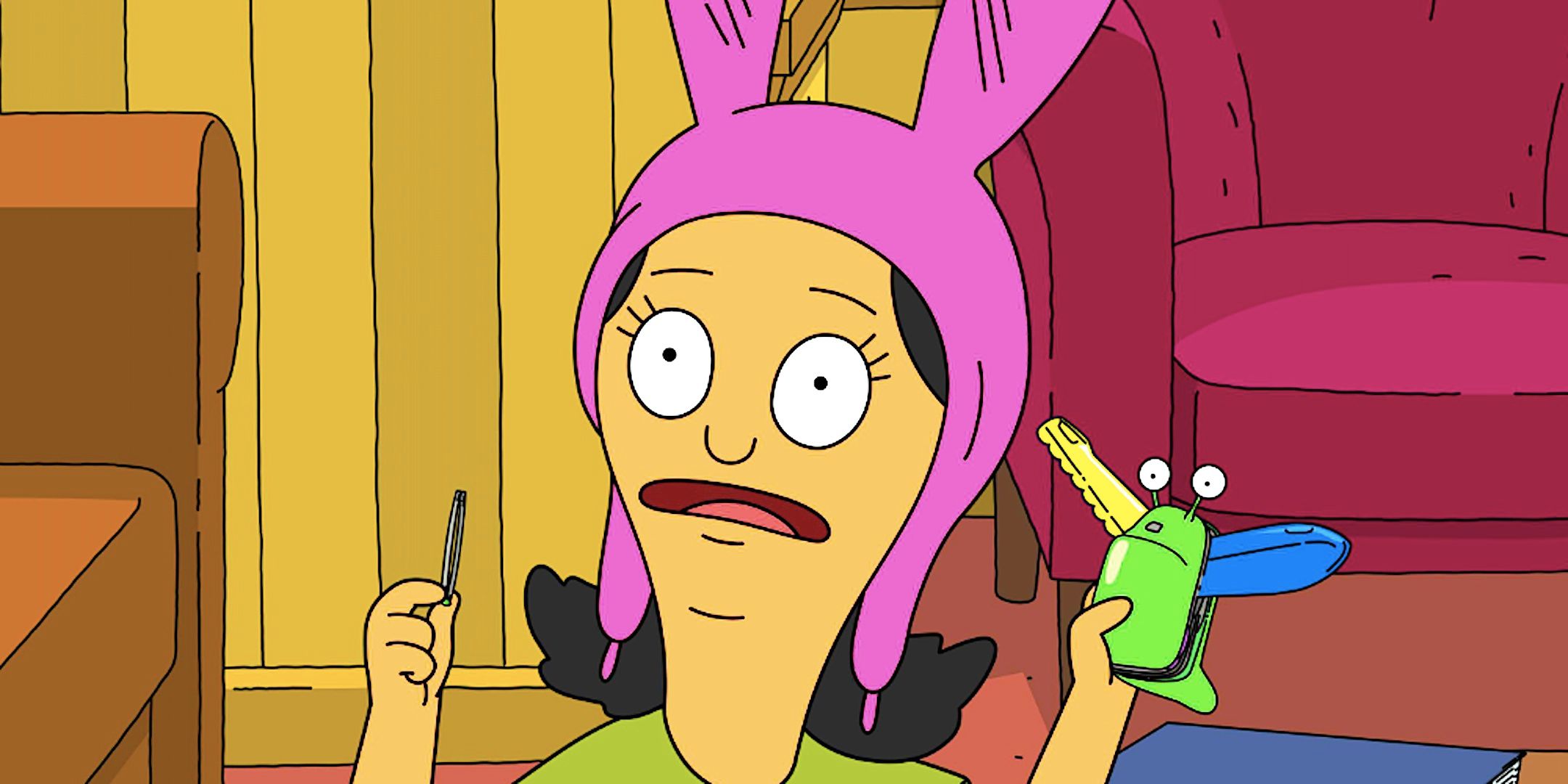 Louise holds up a paperclip and a toy in Bob&rsquo;s Burgers season 15
