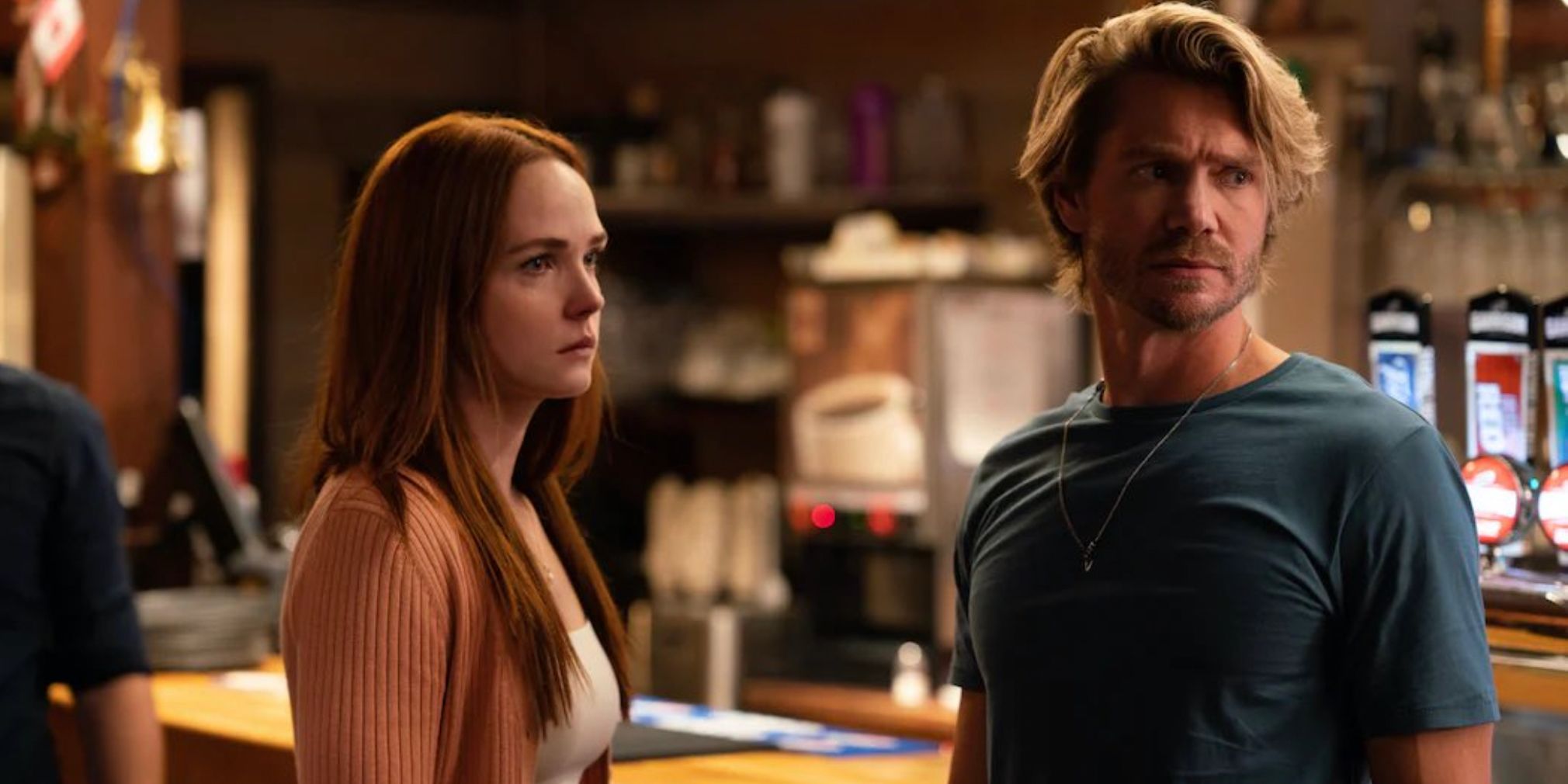 Maggie and Cal looking upset in the bar in Sullivan's Crossing