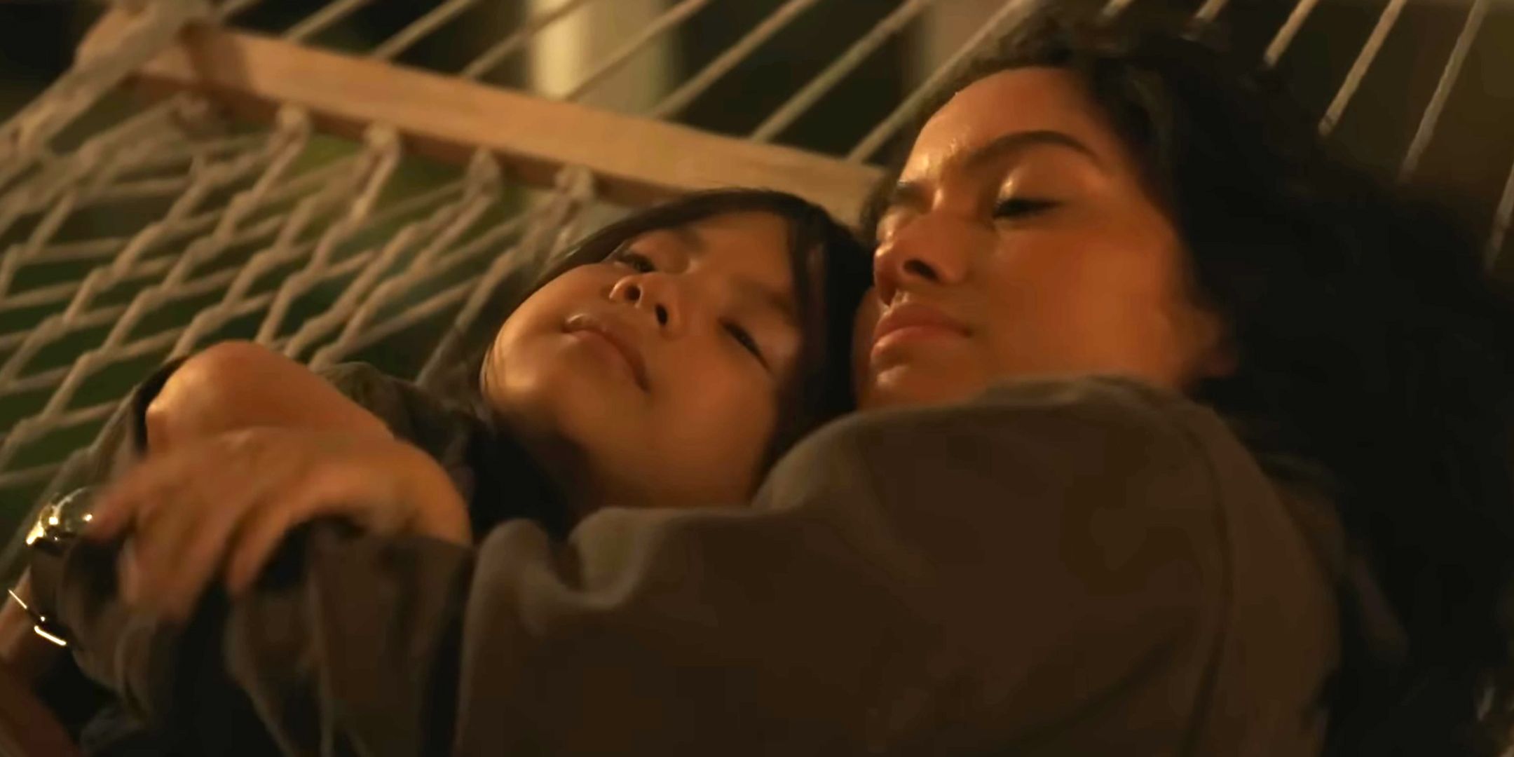 Maia Kealoha's Lilo & Sydney Agudong laying with each other in a hammock in Lilo & Sтιтch