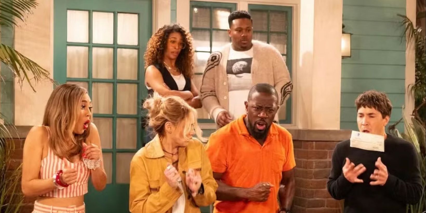 Marty and Malcolm with the cast of the backdoor pilot for their Neighborhood spinoff series all looking surprised