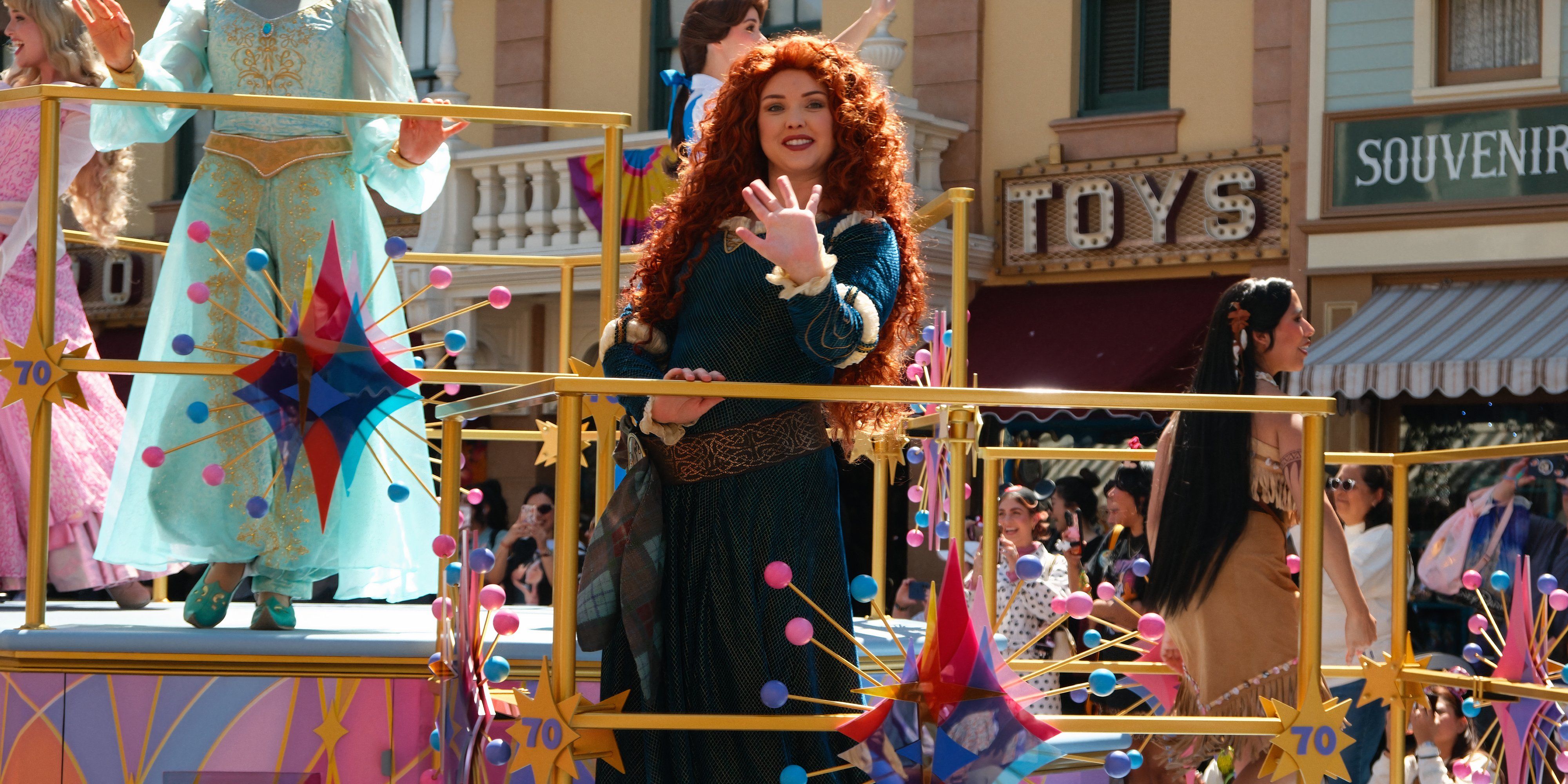 Merida waving during Mickey and Friends Celebrate Happy Calvacade show in Disneyland