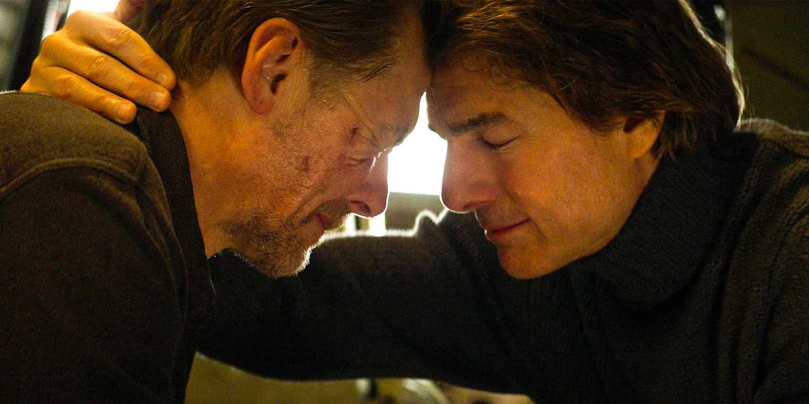 Benji Dunn (Simon Pegg) and Ethan Hunt (Tom Cruise) crying as they press their foreheads together in Mission: Impossible - The Final Reckoning