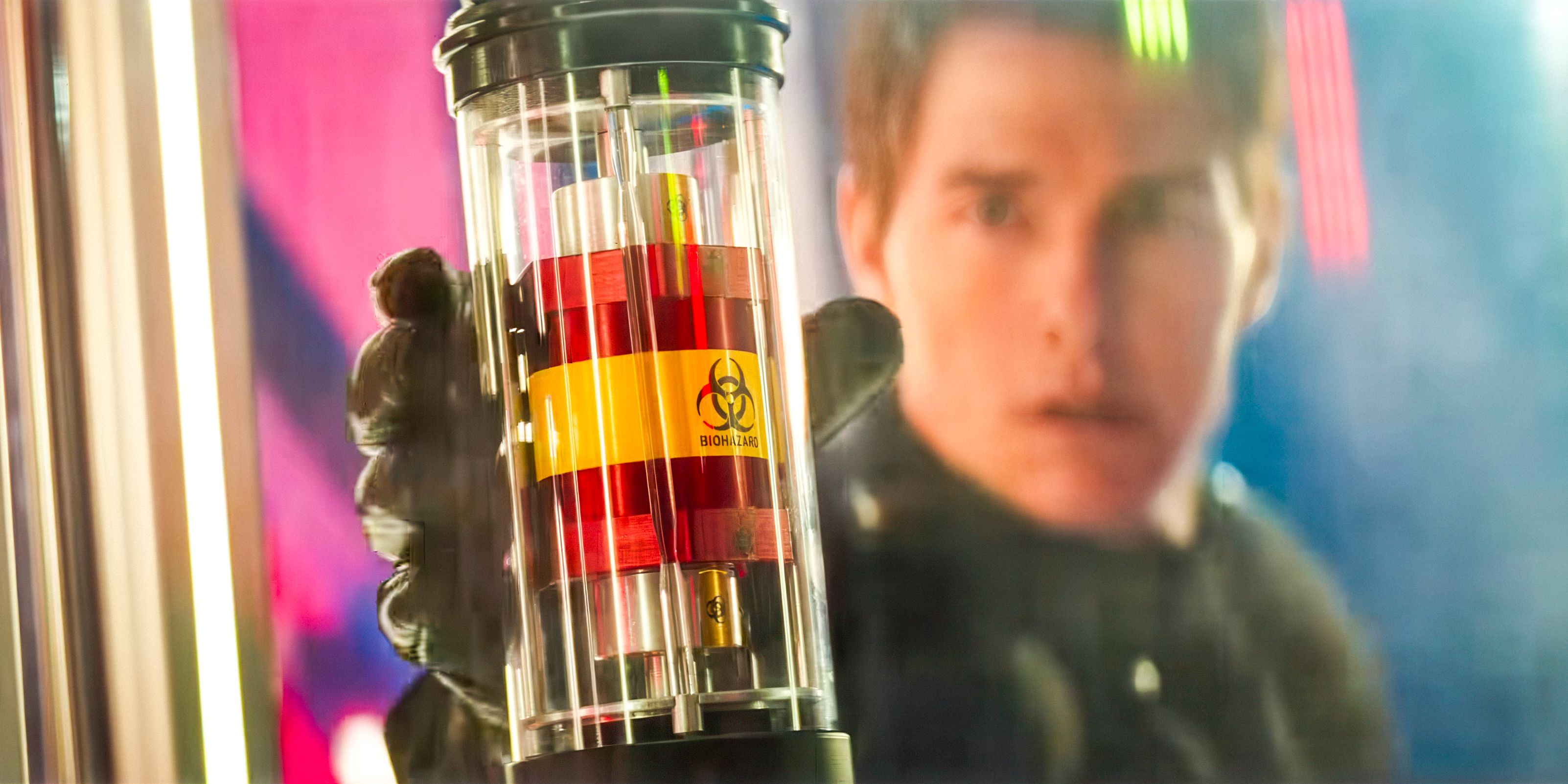 Young Ethan Hunt holding a cylinder with the biohazard symbol in Mission: Impossible - The Final Reckoning
