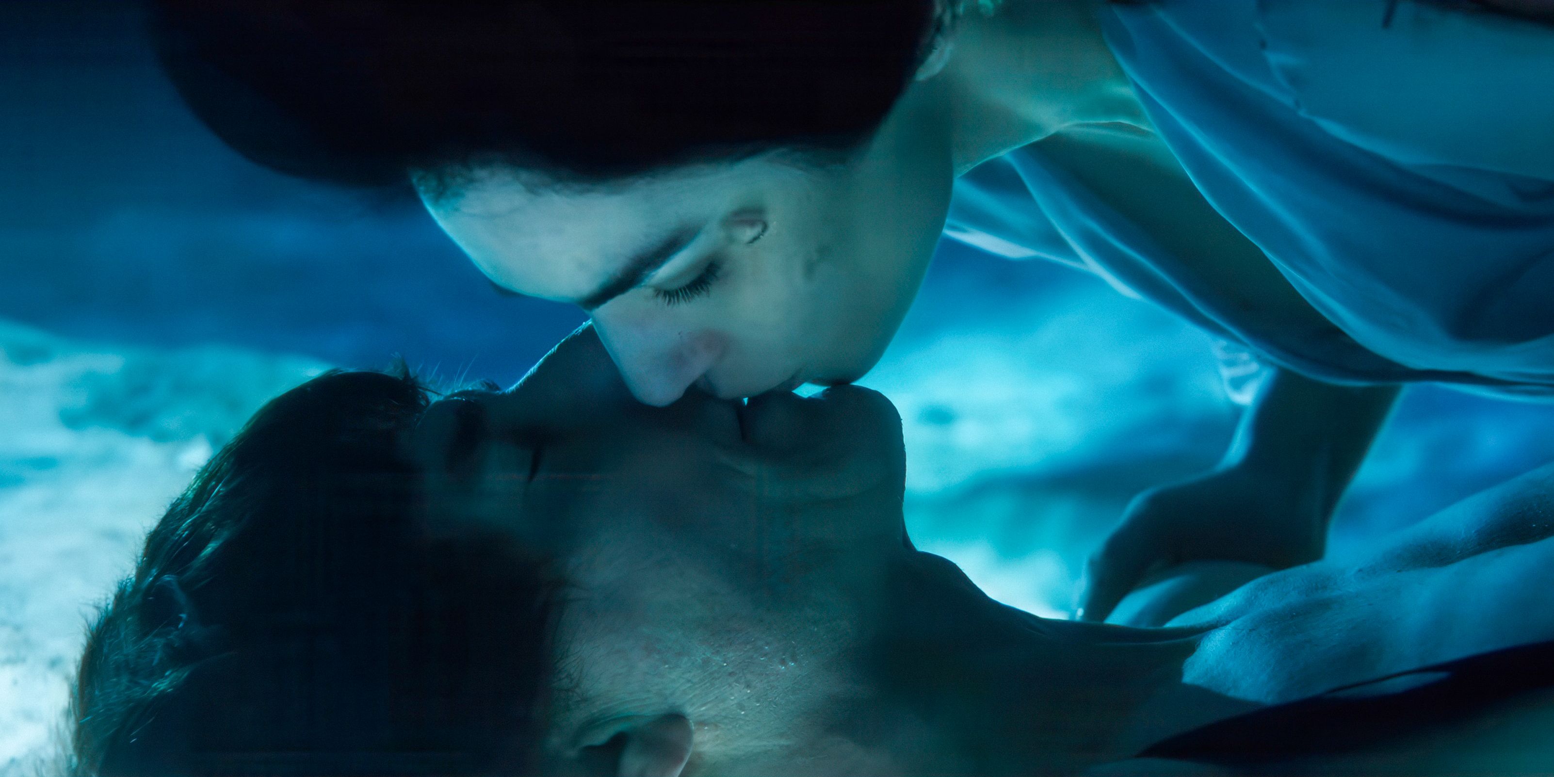 A woman kissing Ethan Hunt (Tom Cruise) underwater in Mission: Impossible - The Final Reckoning
