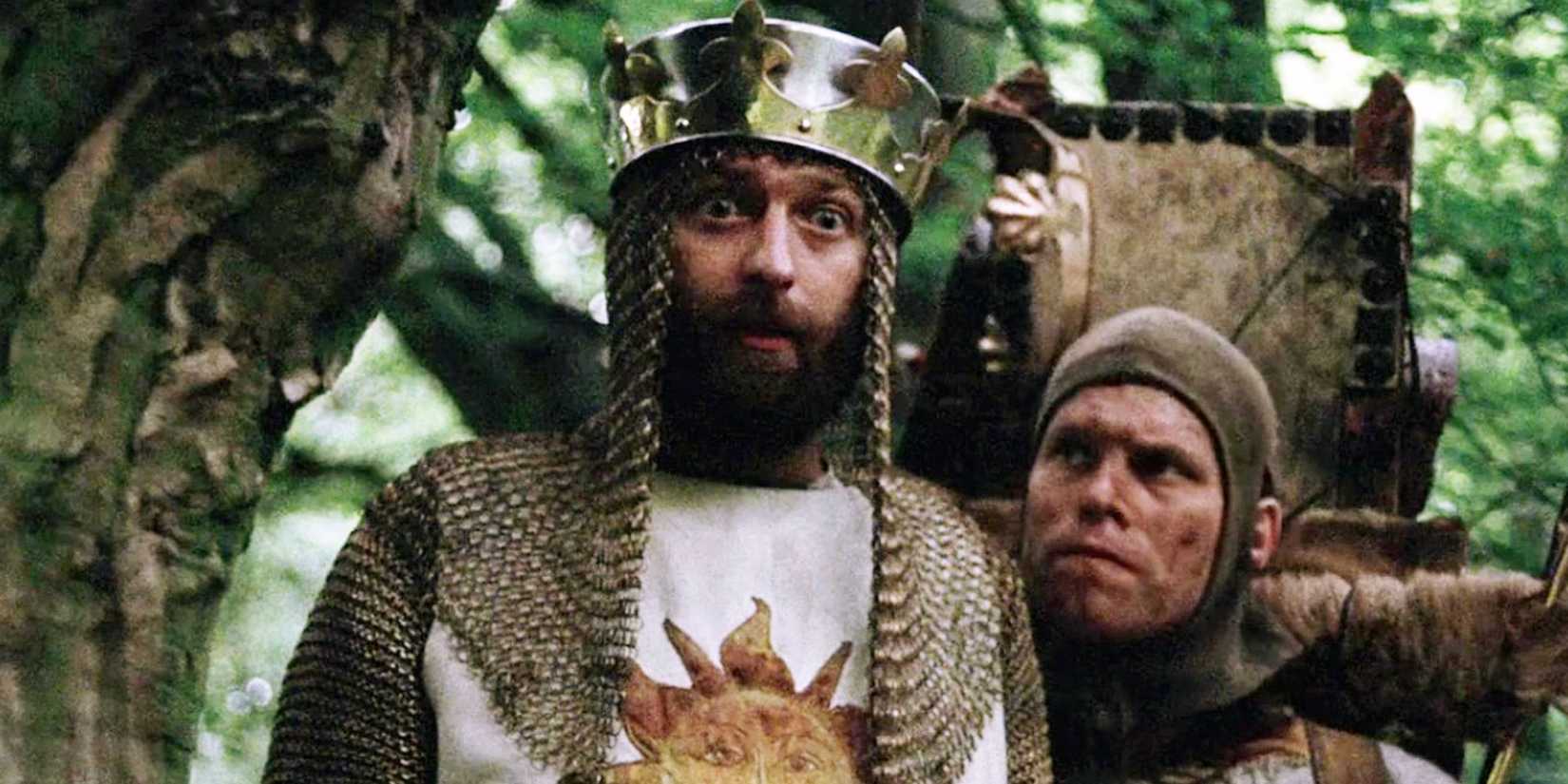 King Arthur looking surprised while Patsy looks at him in Monty Python and the Holy Grail