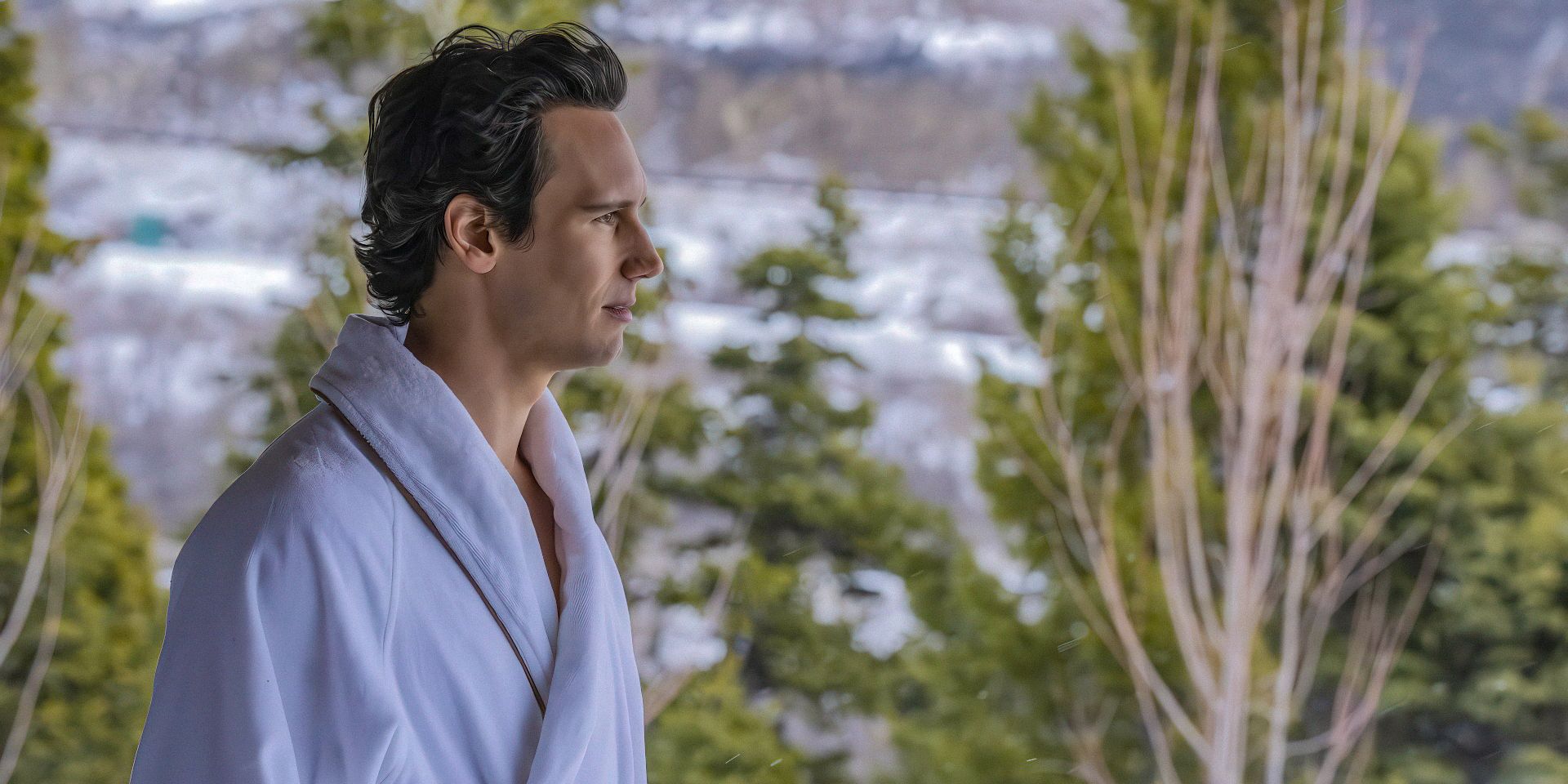 Venis (Cory Michael Smith) looking outside in Mountainhead